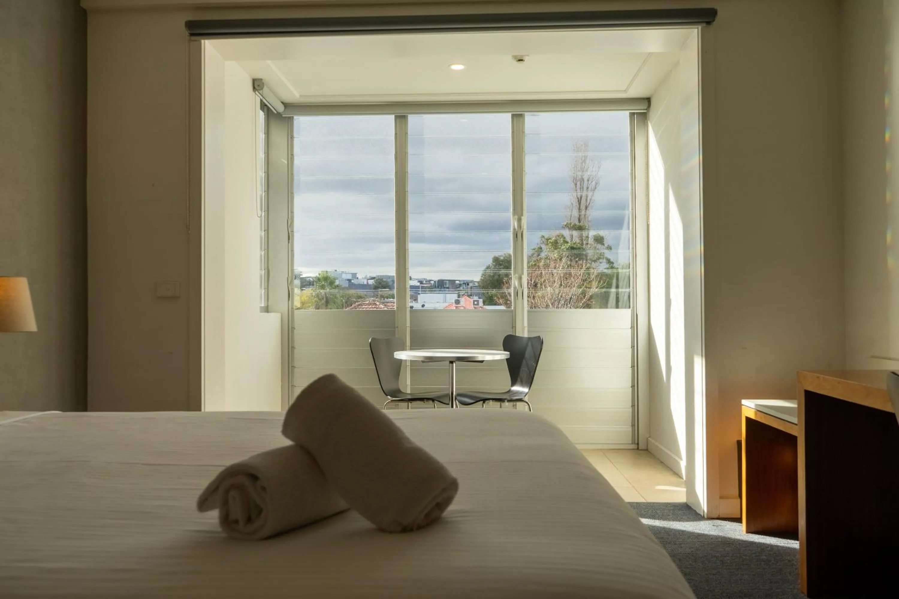 Bed in Cosmopolitan Hotel and Apartments