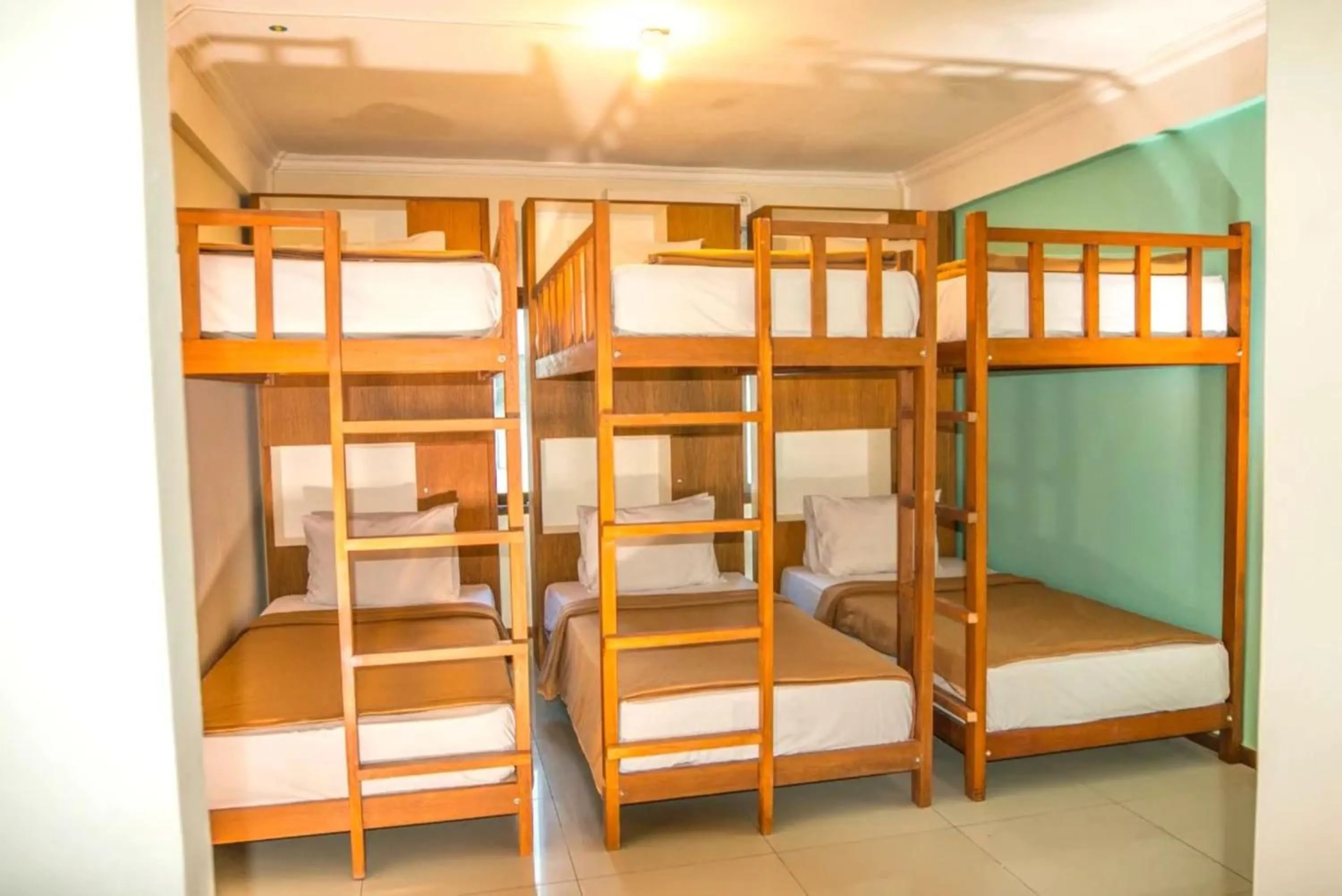 Bed in Maharani Beach Hotel