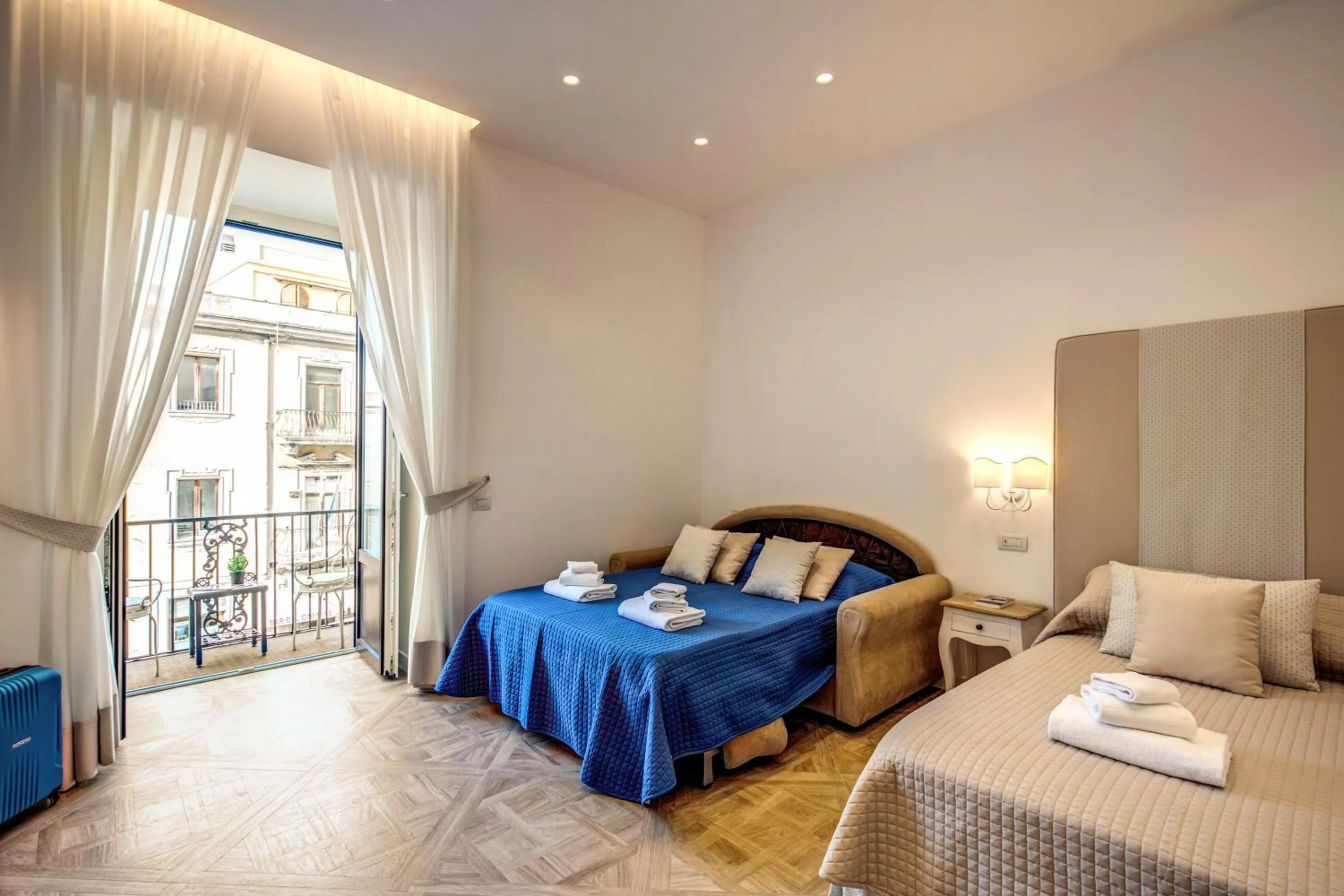 Bed in Sorrento Square Suites