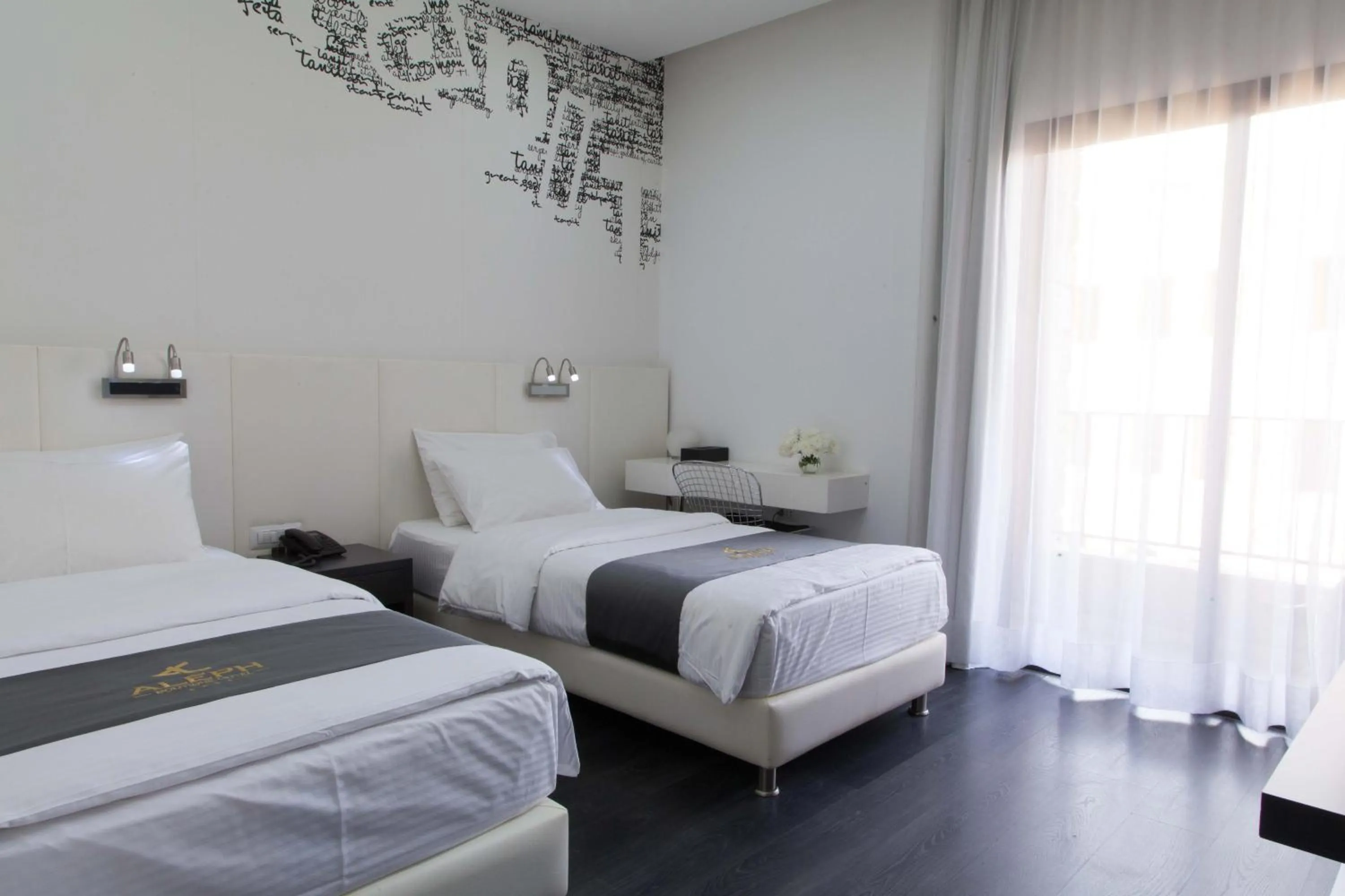Bed in Aleph Boutique Hotel