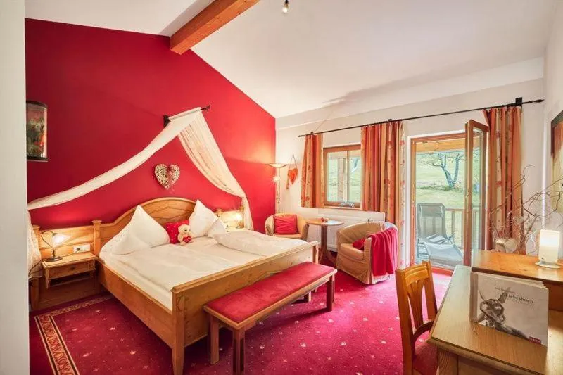 Photo of the whole room, Bed in Landhotel Sportalm