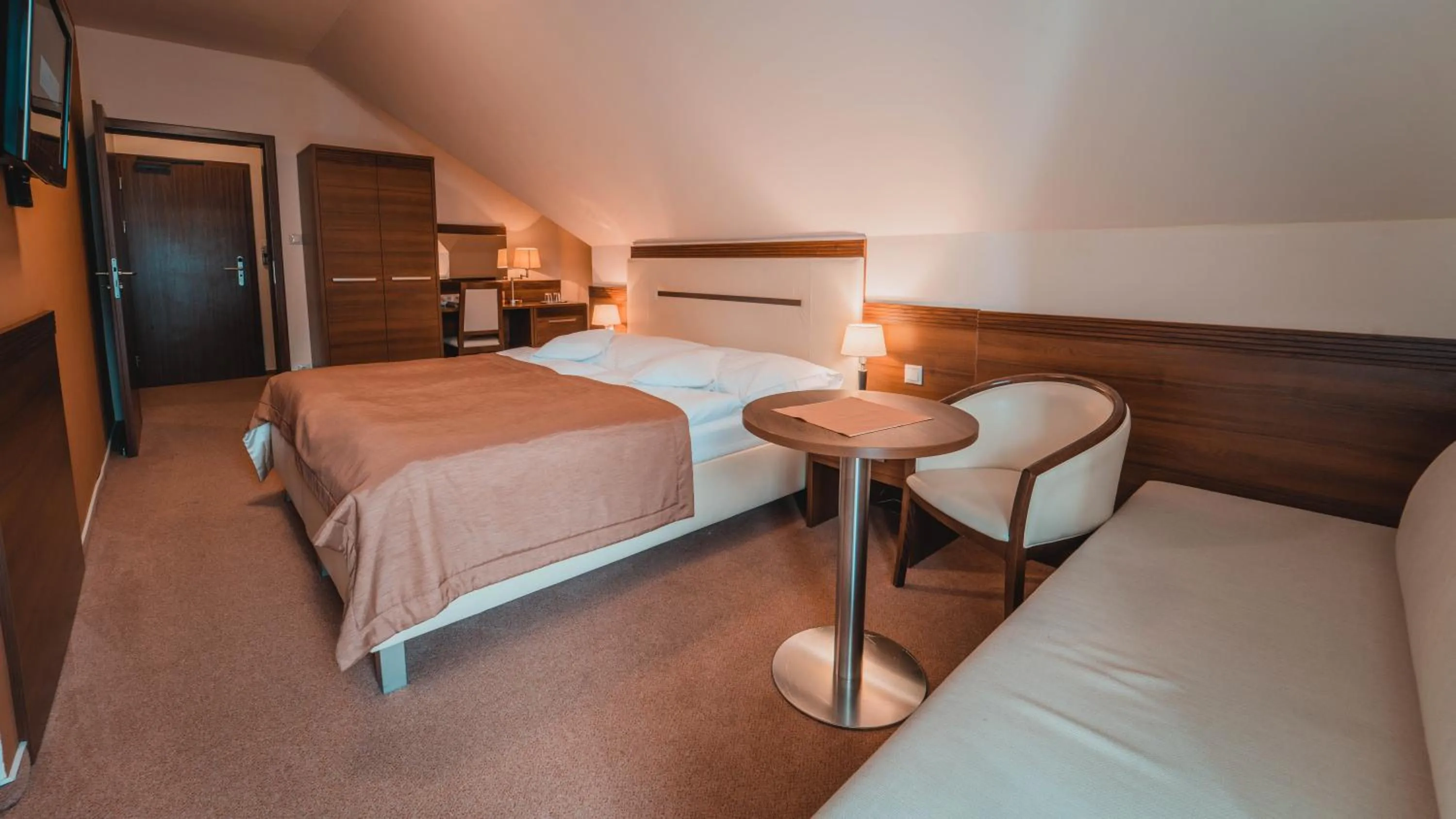 Communal lounge/ TV room, Bed in Dom zdravia - KÚPELE PIENINY