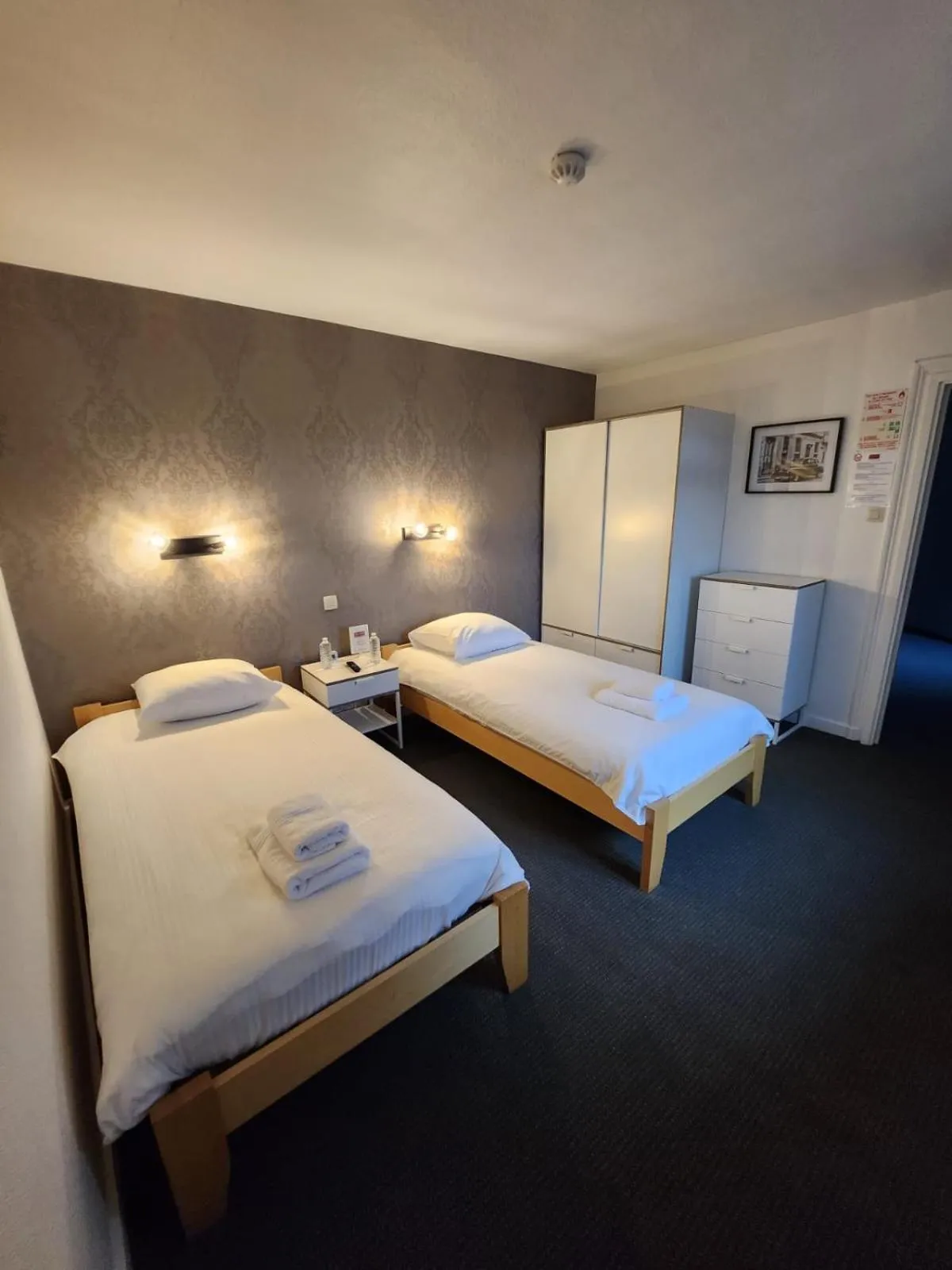 Bed in Hôtel Francorchamps Pitlane Lodge