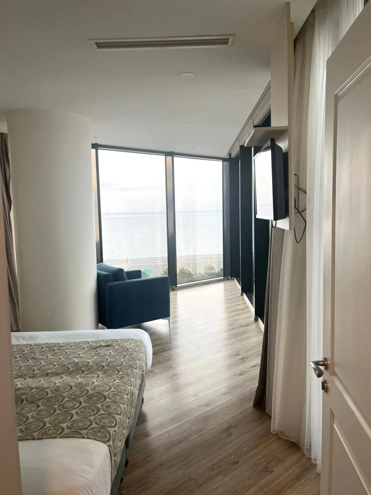 Bed in Bellevue Residence Suites