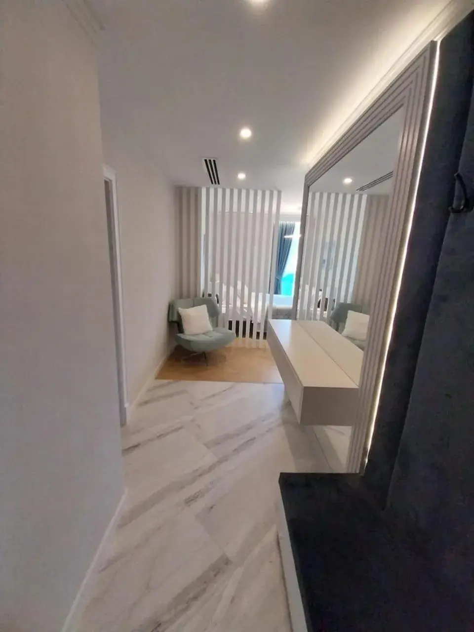 Living room, Bed in Bellevue Residence Suites Living room, Bed in Bellevue Residence Suites