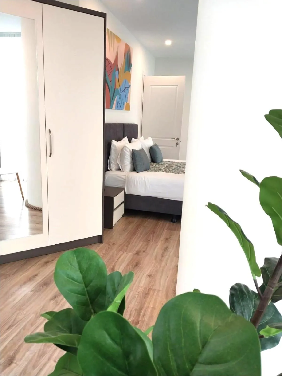 Bed in Bellevue Residence Suites