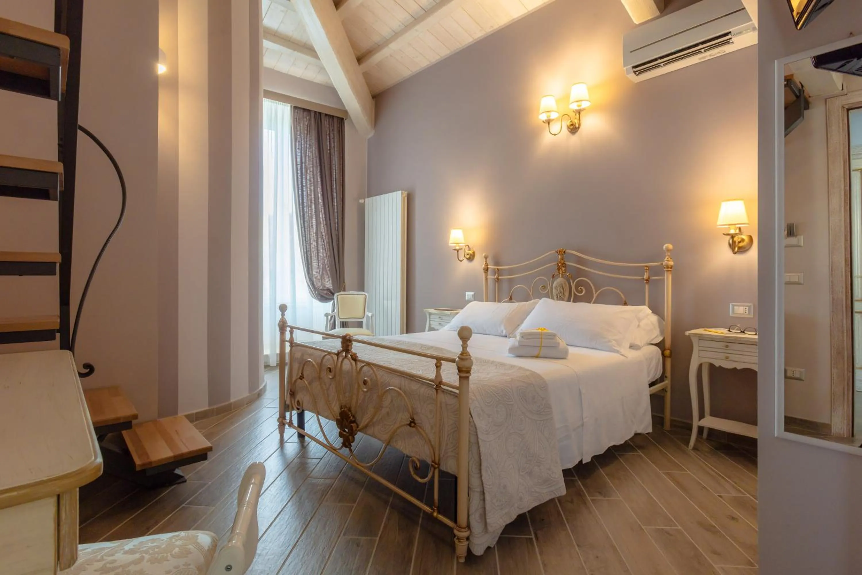 Quadruple Room with Private Bathroom in Le torri di Tarquinia