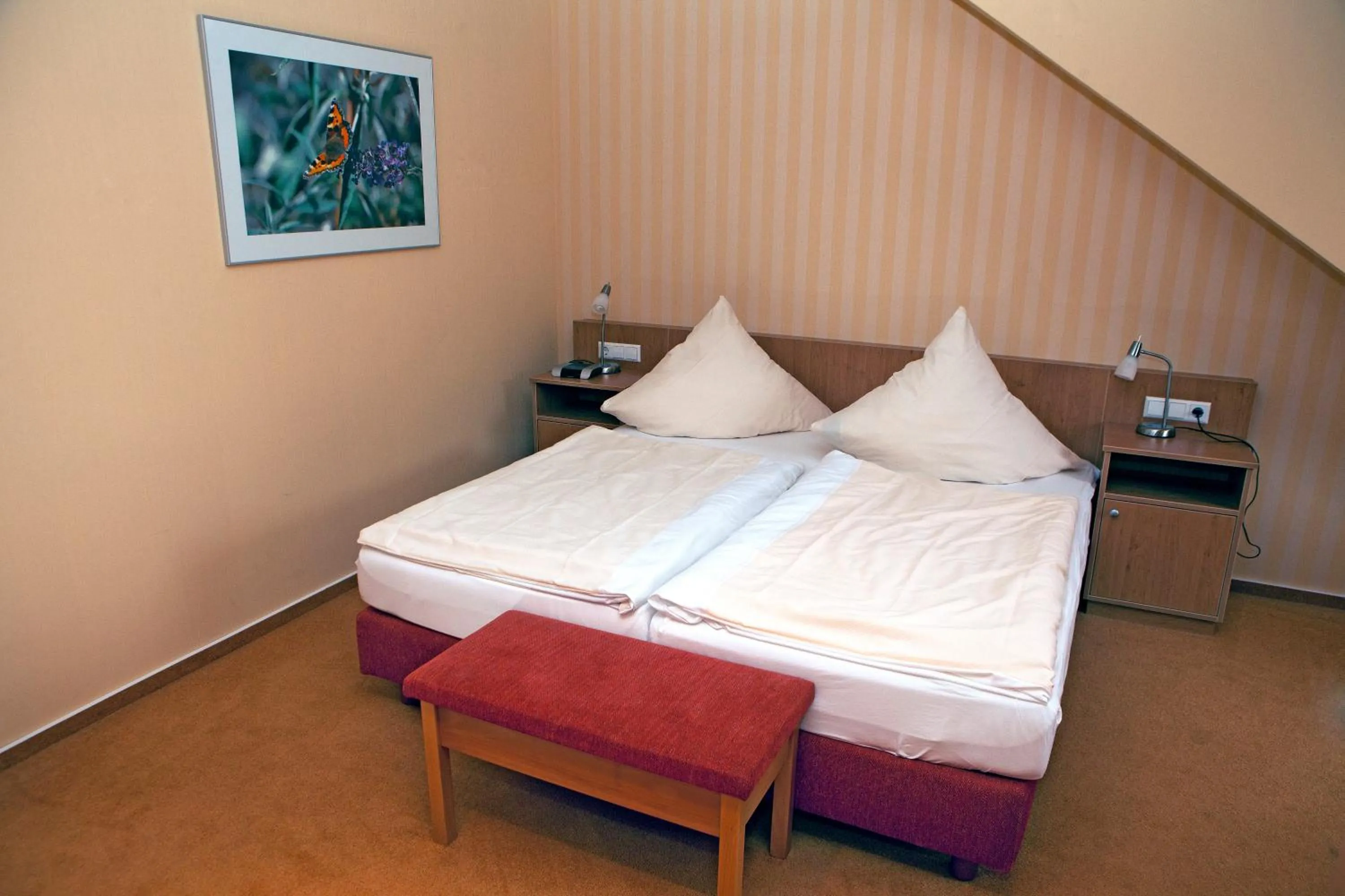 Photo of the whole room, Bed in Ringhotel Alfsee Piazza
