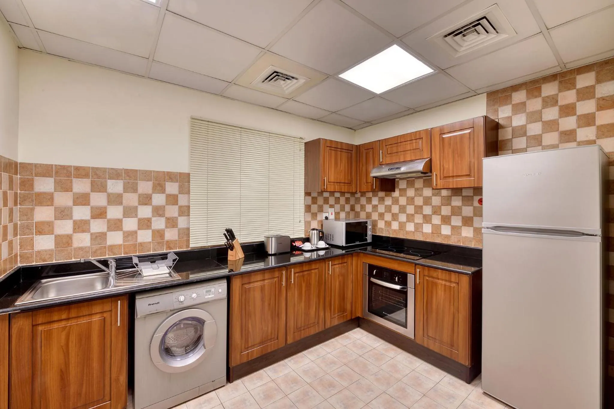 Kitchen or kitchenette in Pearl Marina Hotel Apartments