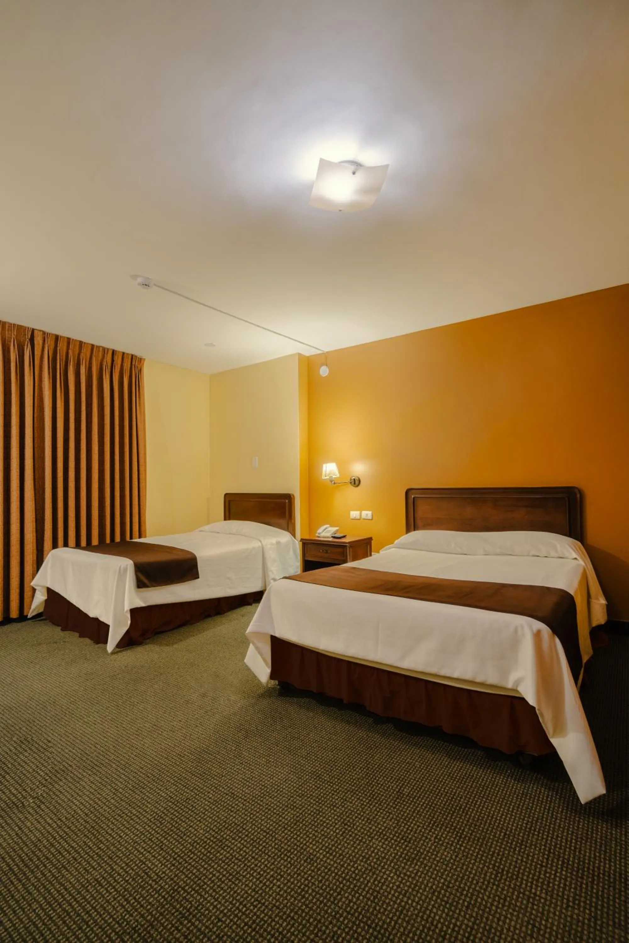 Bed in Cesar´s Hotel La Merced