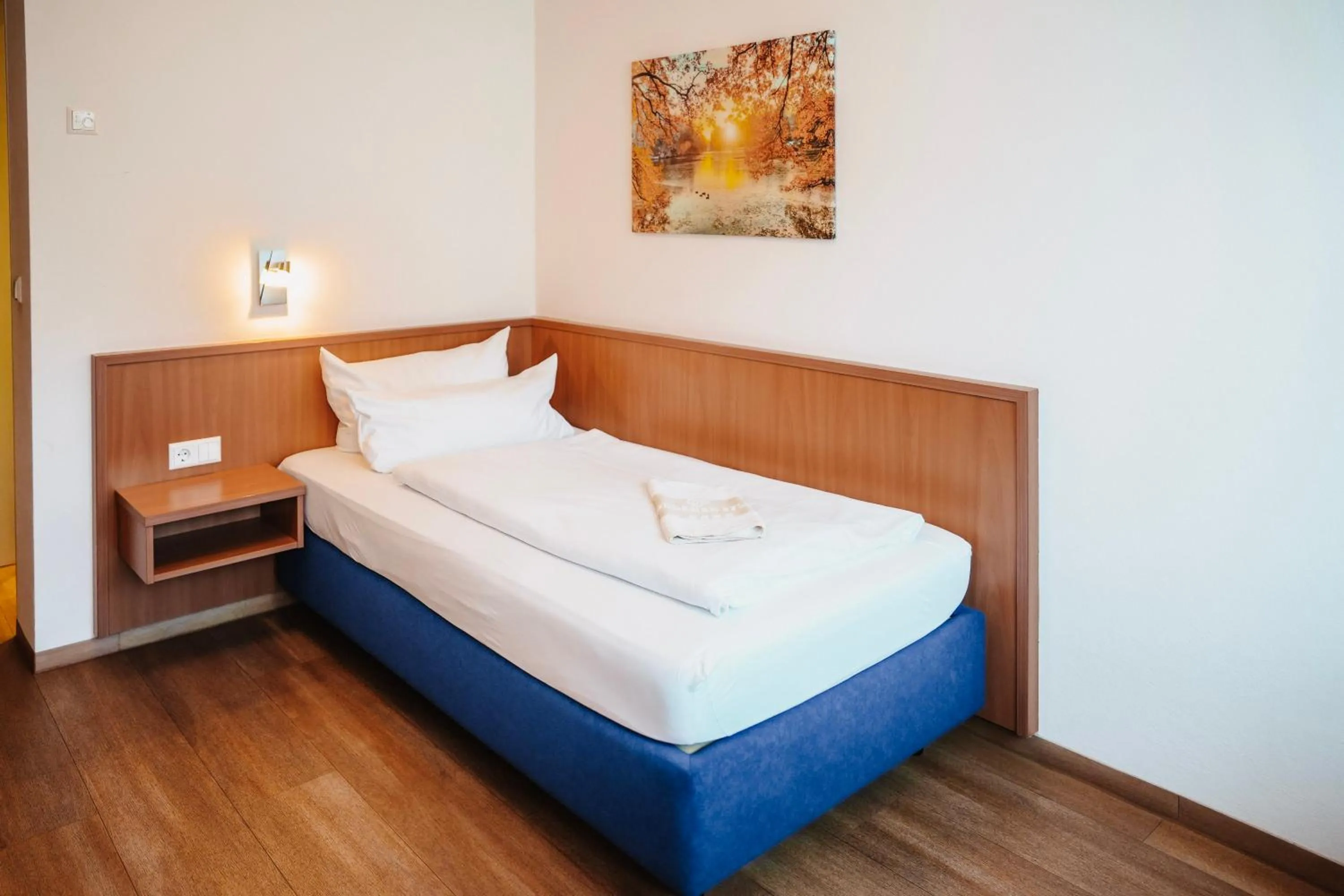 Bed in Hotel & Restaurant Goldener Pflug