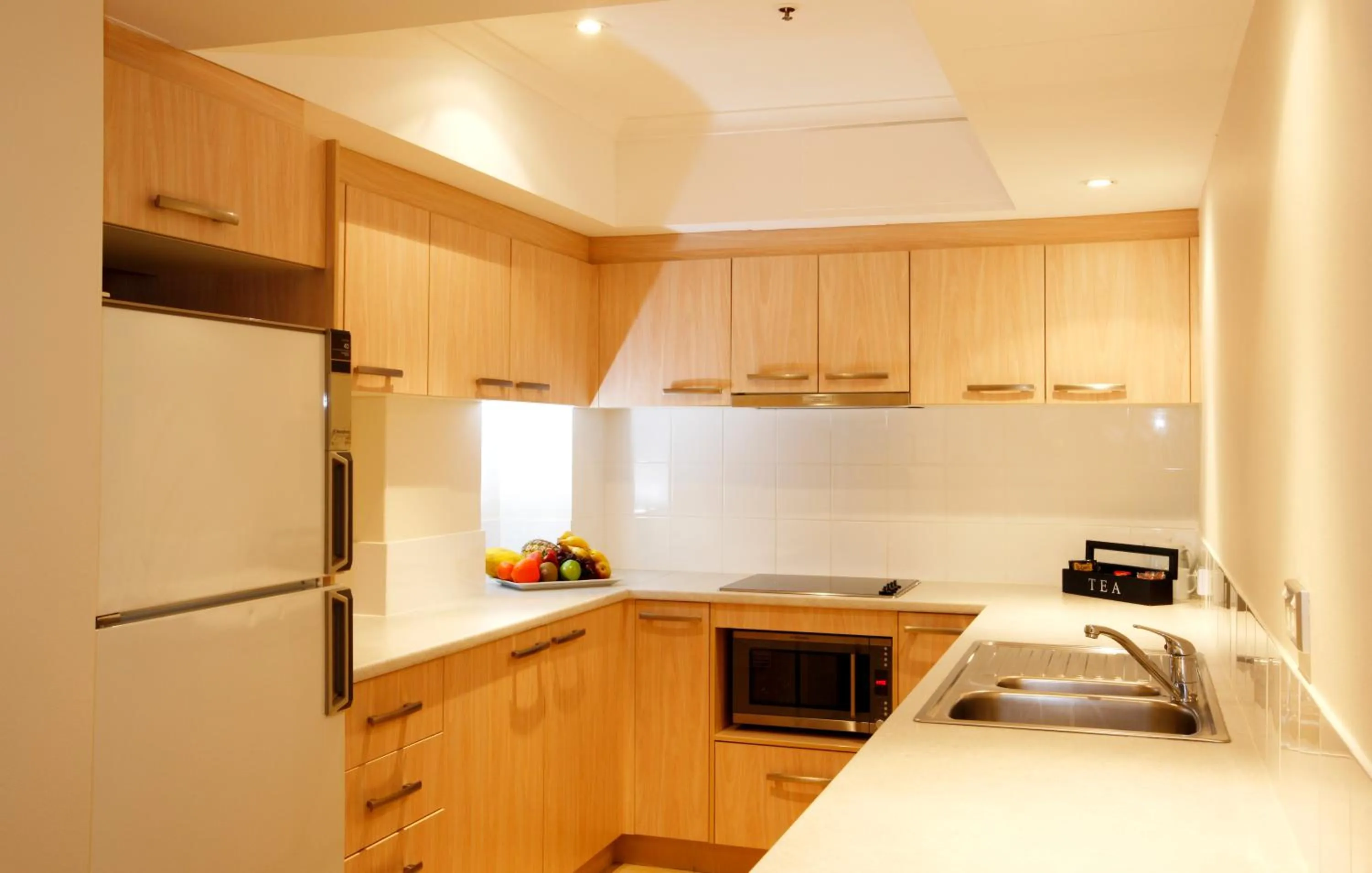 Kitchen or kitchenette in The York by Swiss-Belhotel