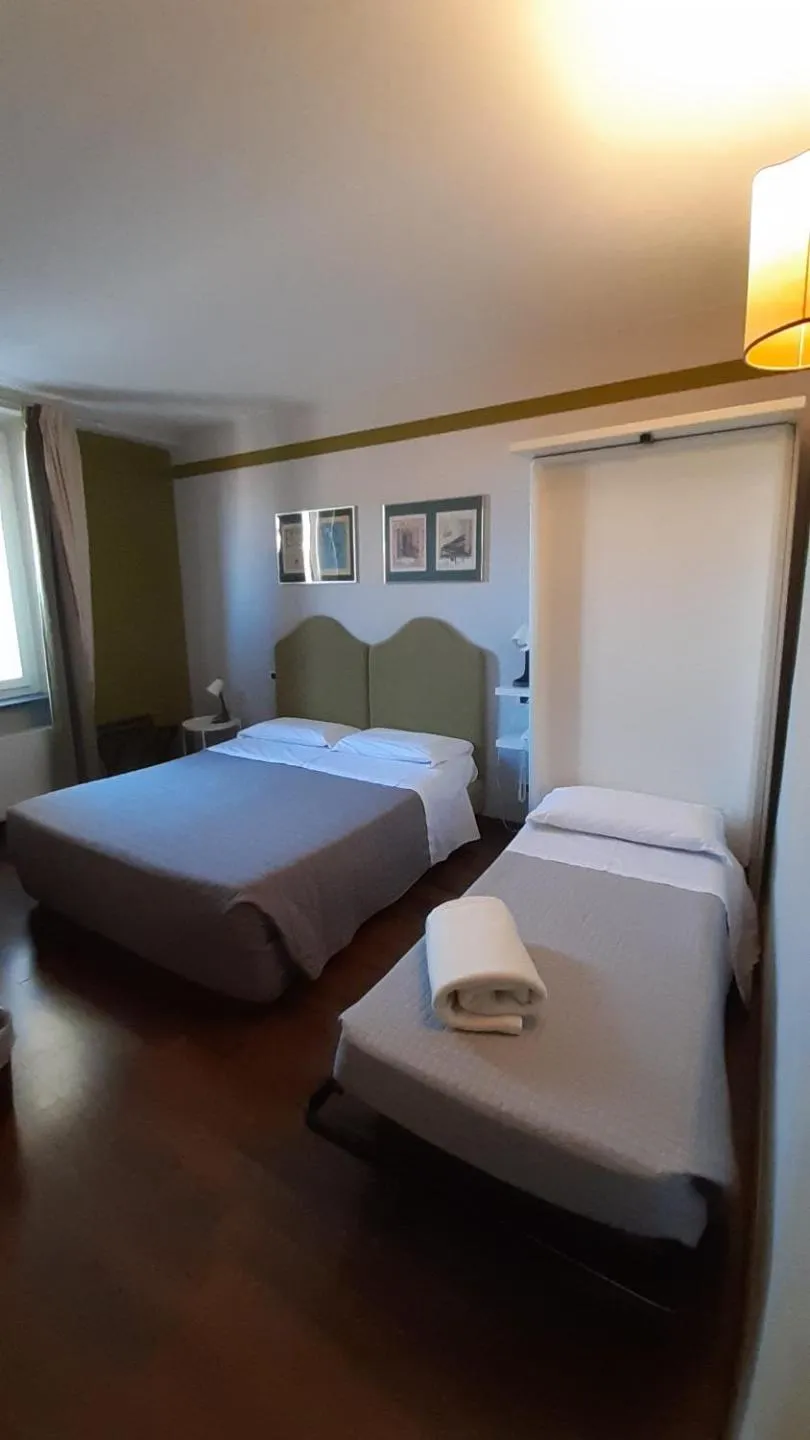 Bed in Albergo Moderno