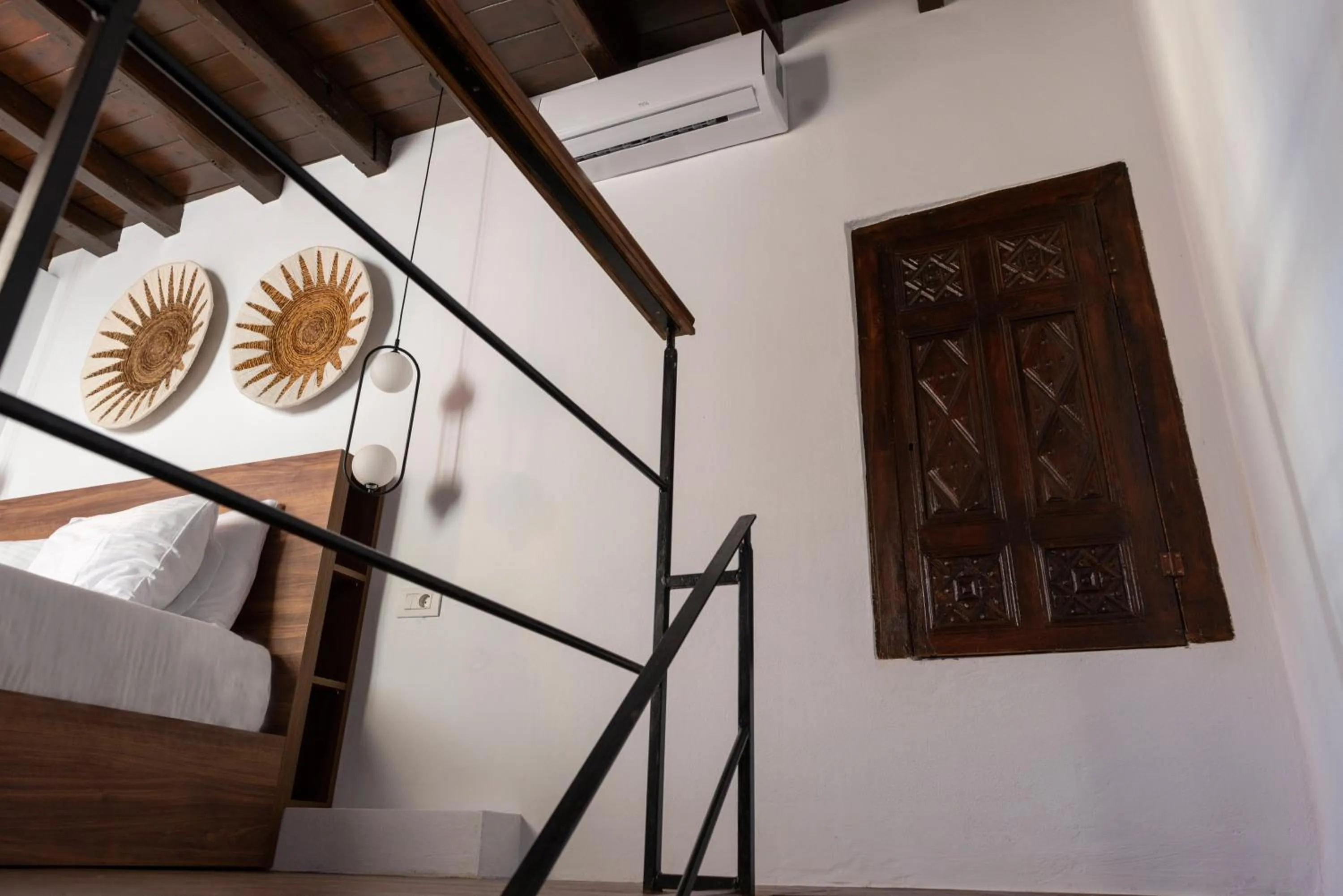 Bedroom in Blue Jasmine Suites