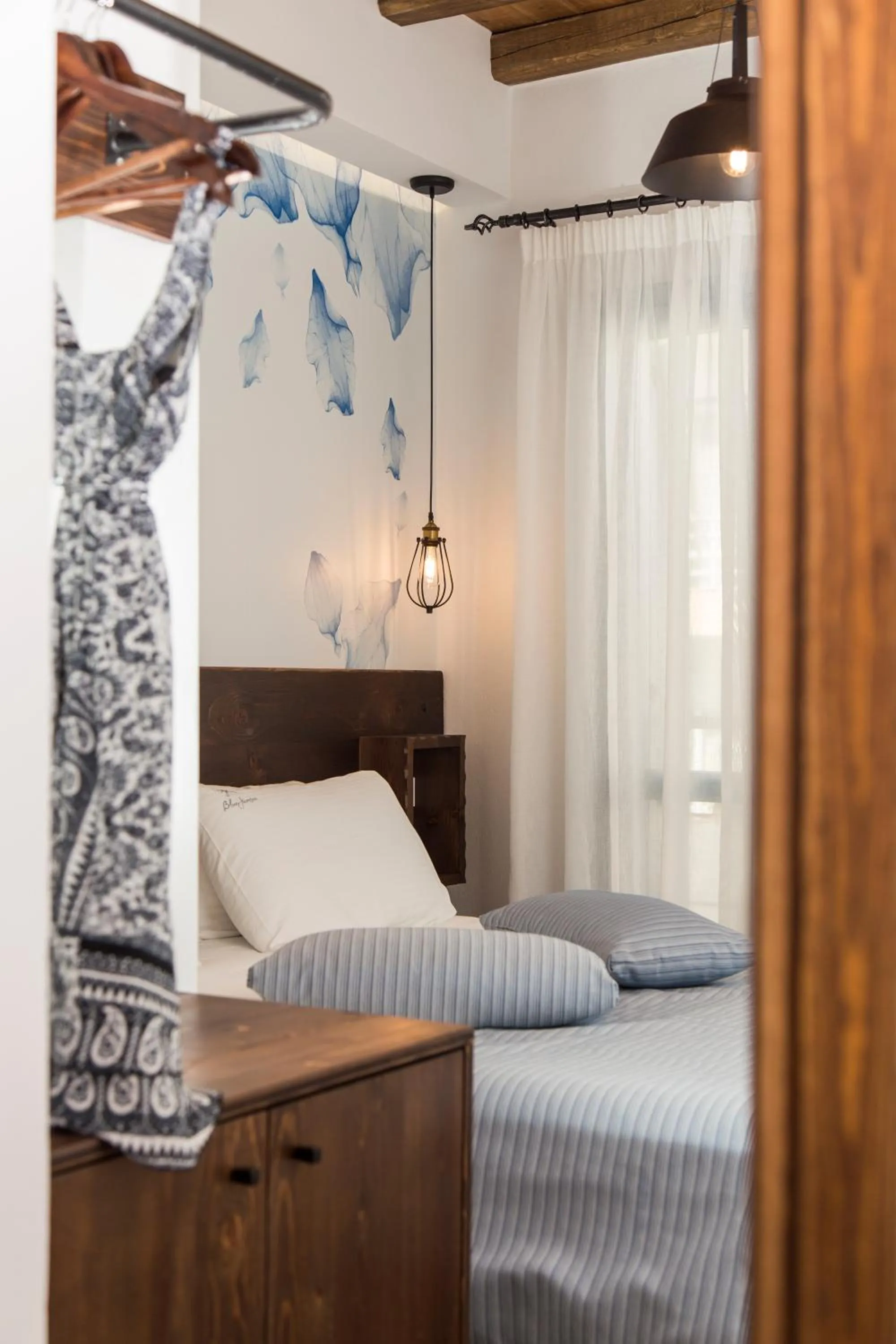 Bed in Blue Jasmine Suites