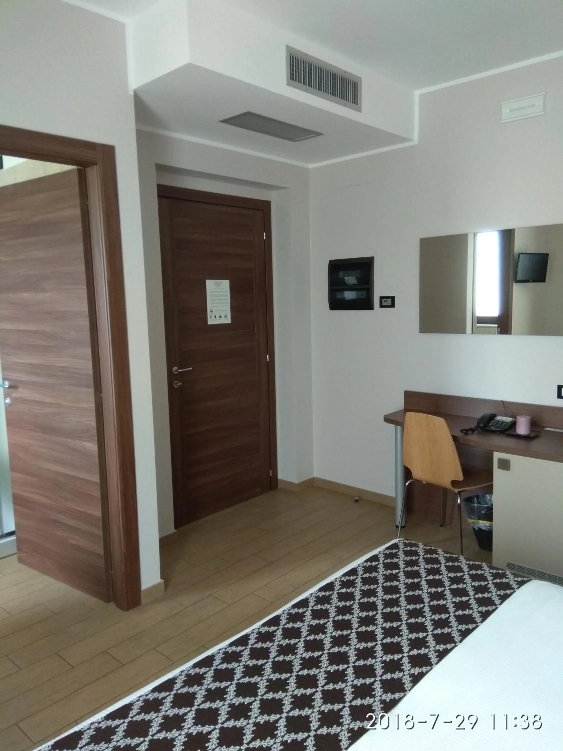 Bedroom in Hotel Residence Eden