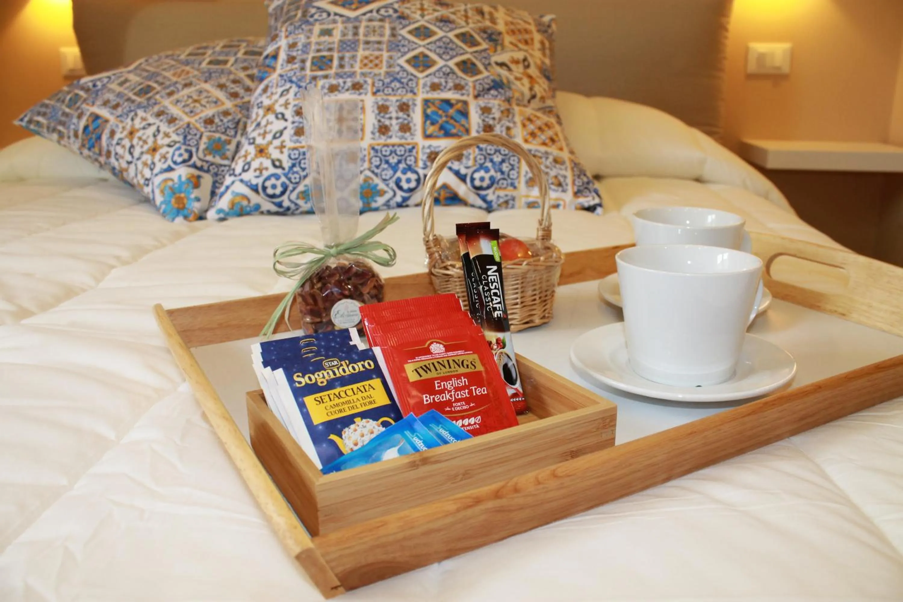 Bed in Taormina Bedda Rooms