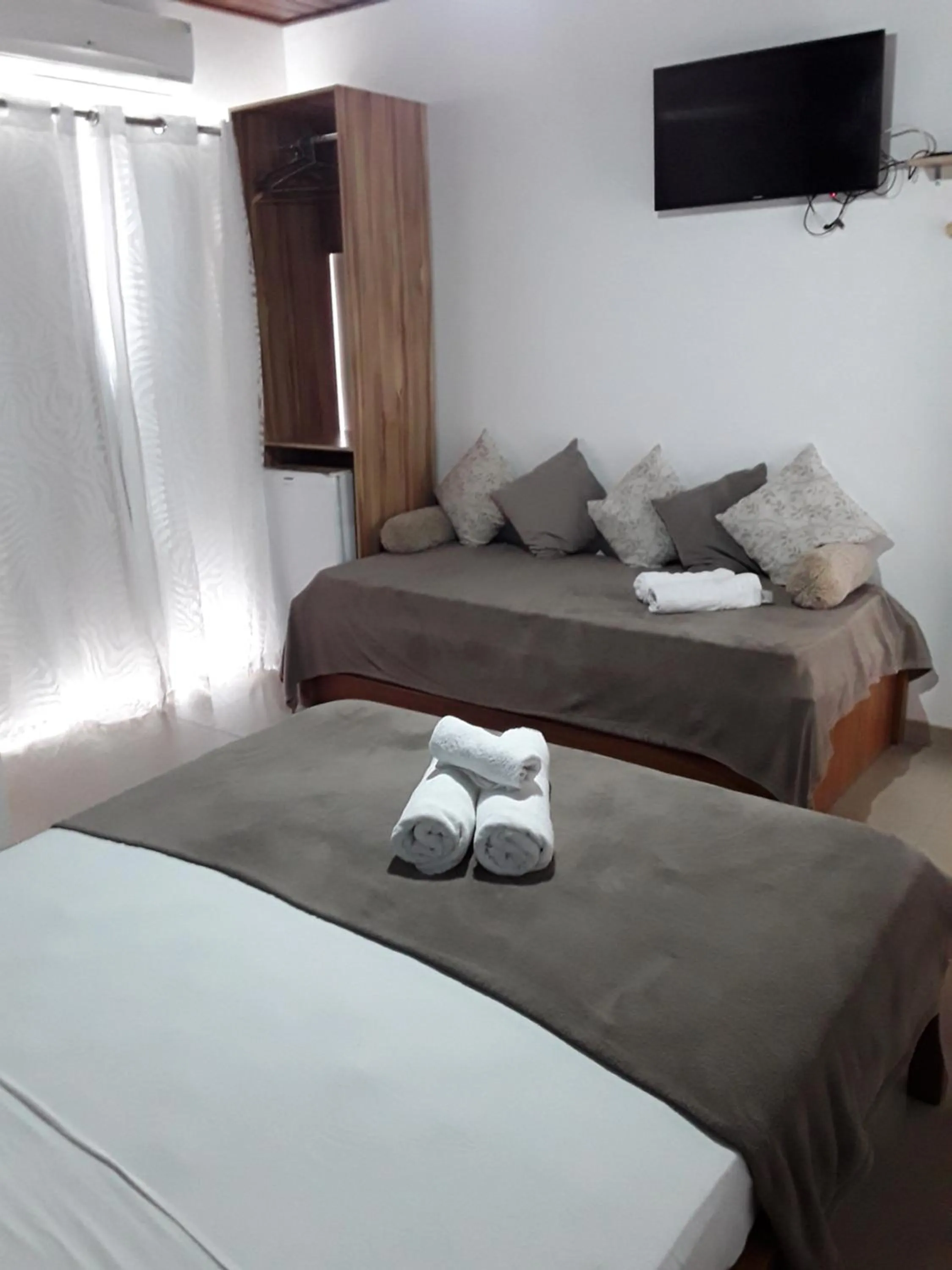 Bed in Pousada Sereia de Geriba