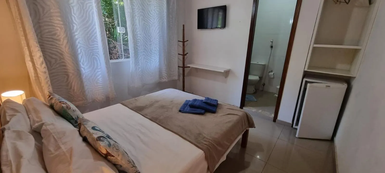 Bed in Pousada Sereia de Geriba