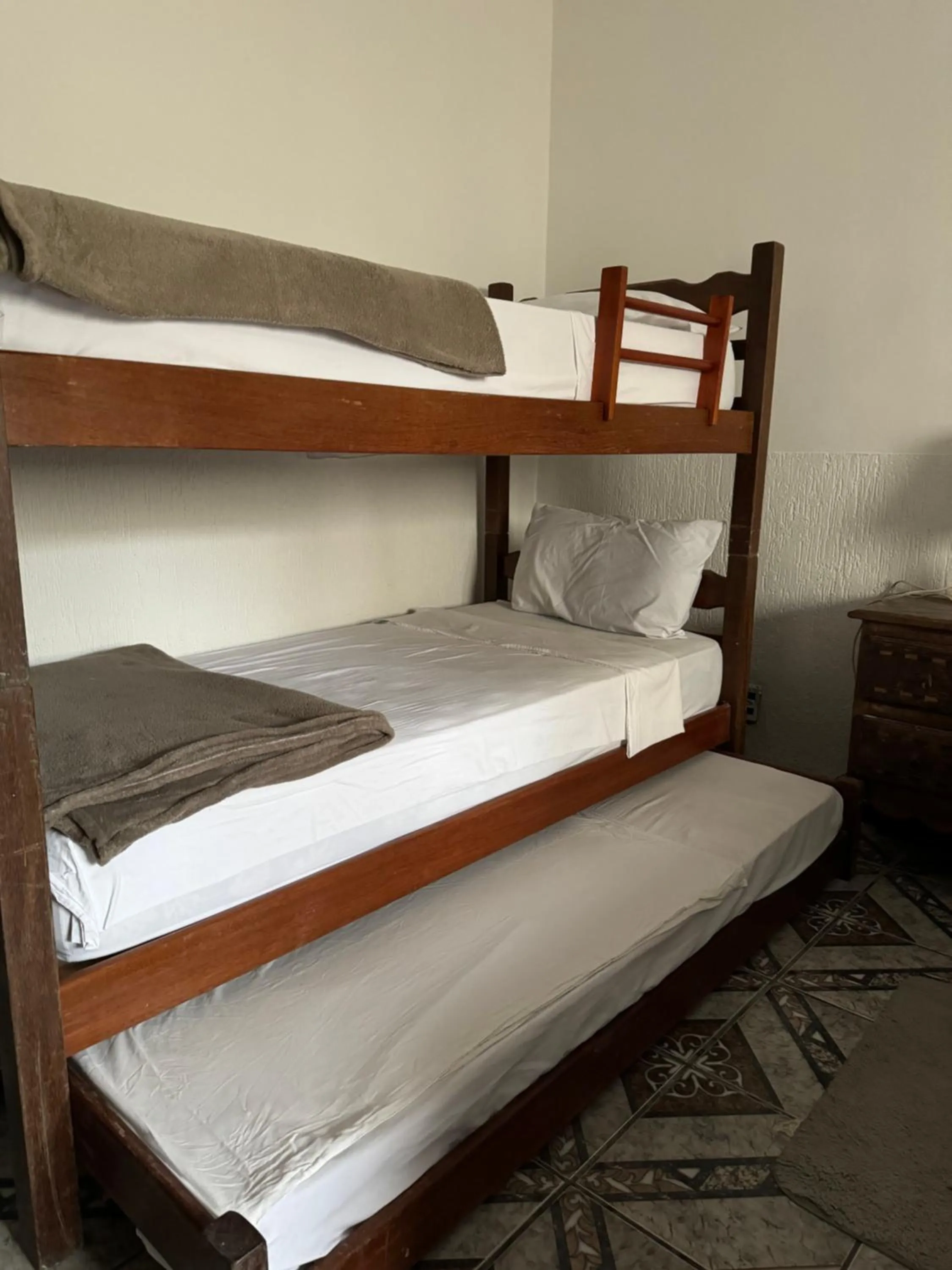 Bed in Pousada Sereia de Geriba