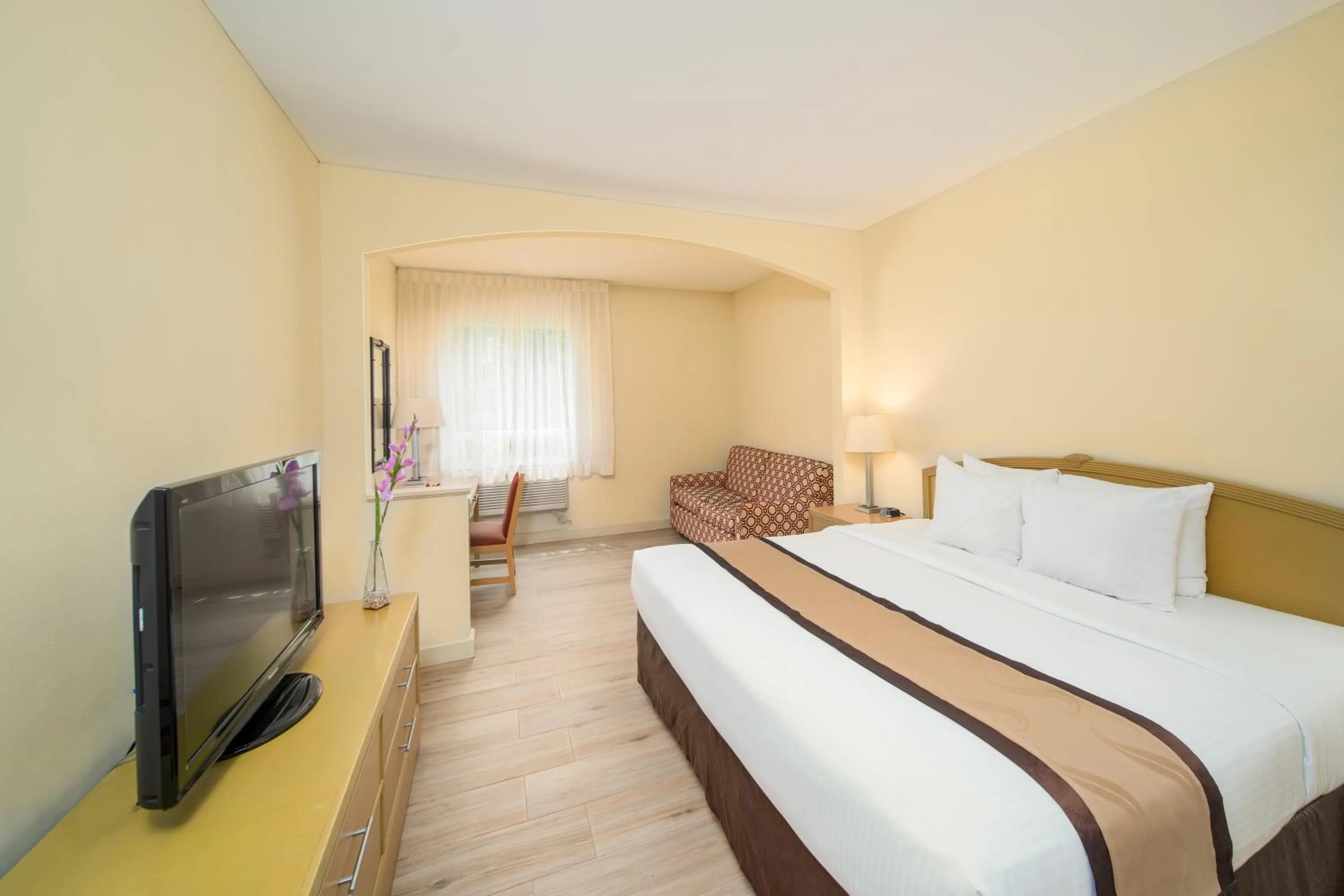 Bed in Quality Hotel Real Aeropuerto San Salvador