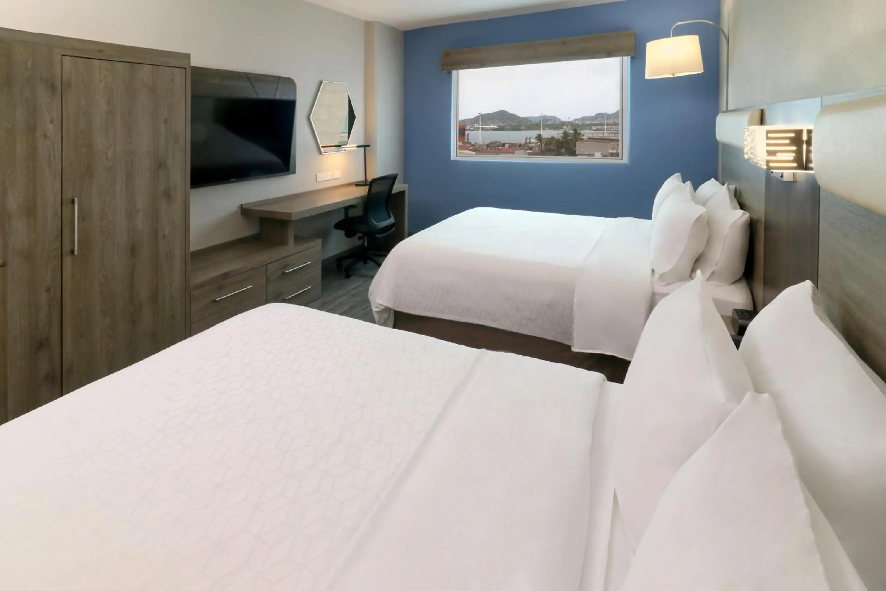 Photo of the whole room, Bed in Holiday Inn Express Manzanillo by IHG Photo of the whole room, Bed in Holiday Inn Express Manzanillo by IHG