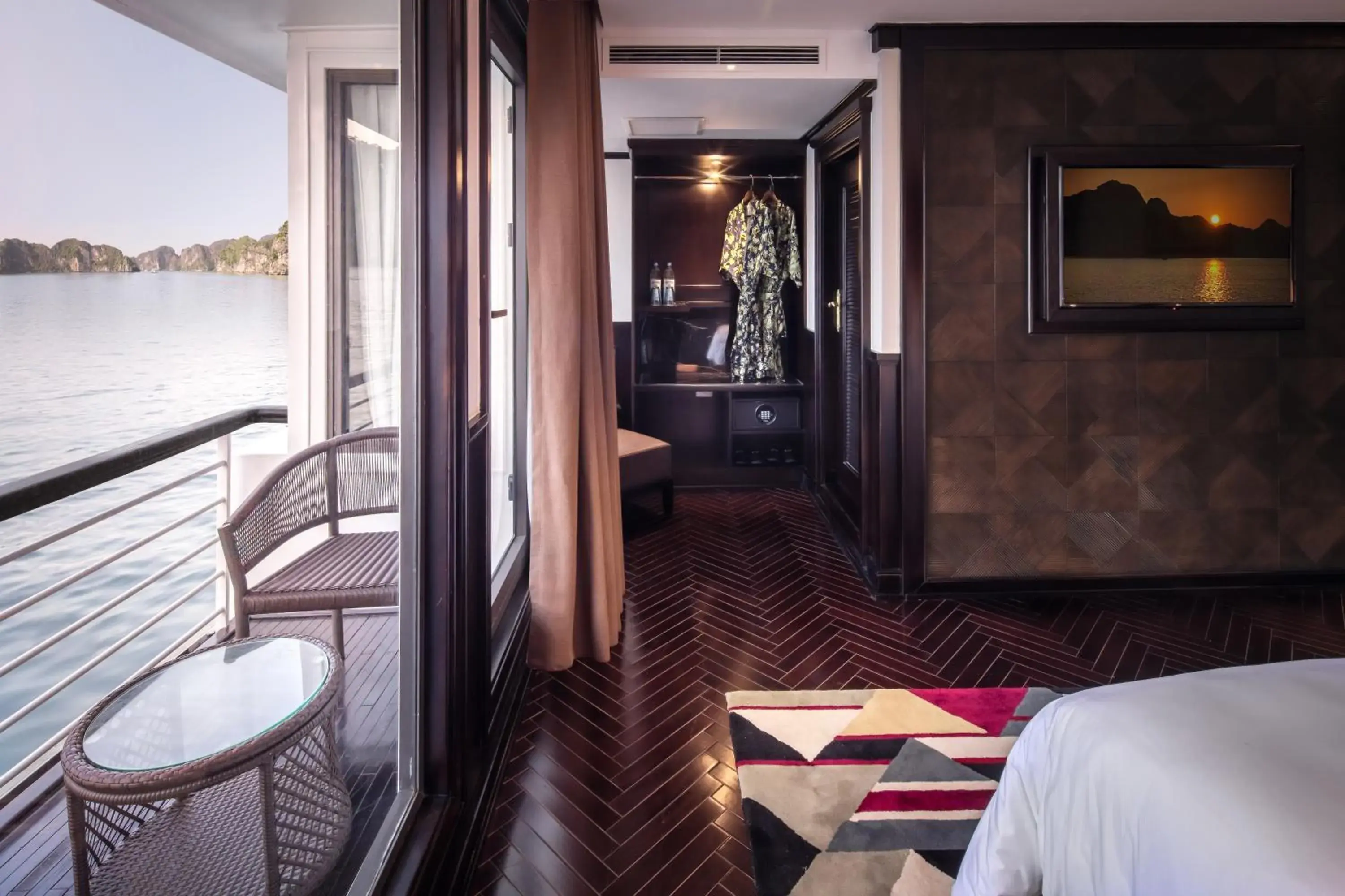 Balcony/Terrace, Bed in Ambassador Cruise Halong Bay Balcony/Terrace, Bed in Ambassador Cruise Halong Bay