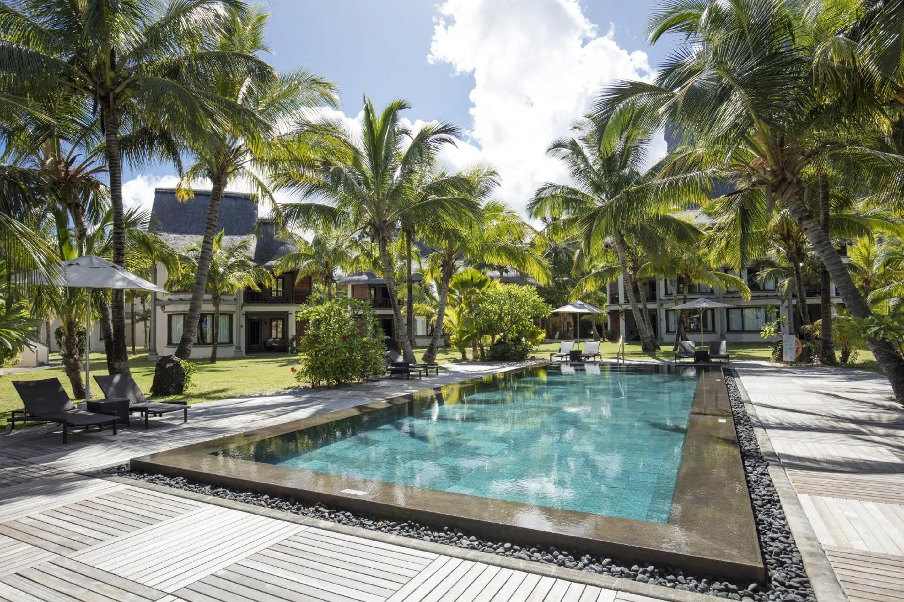Pool view in Dinarobin Beachcomber Golf Resort & Spa