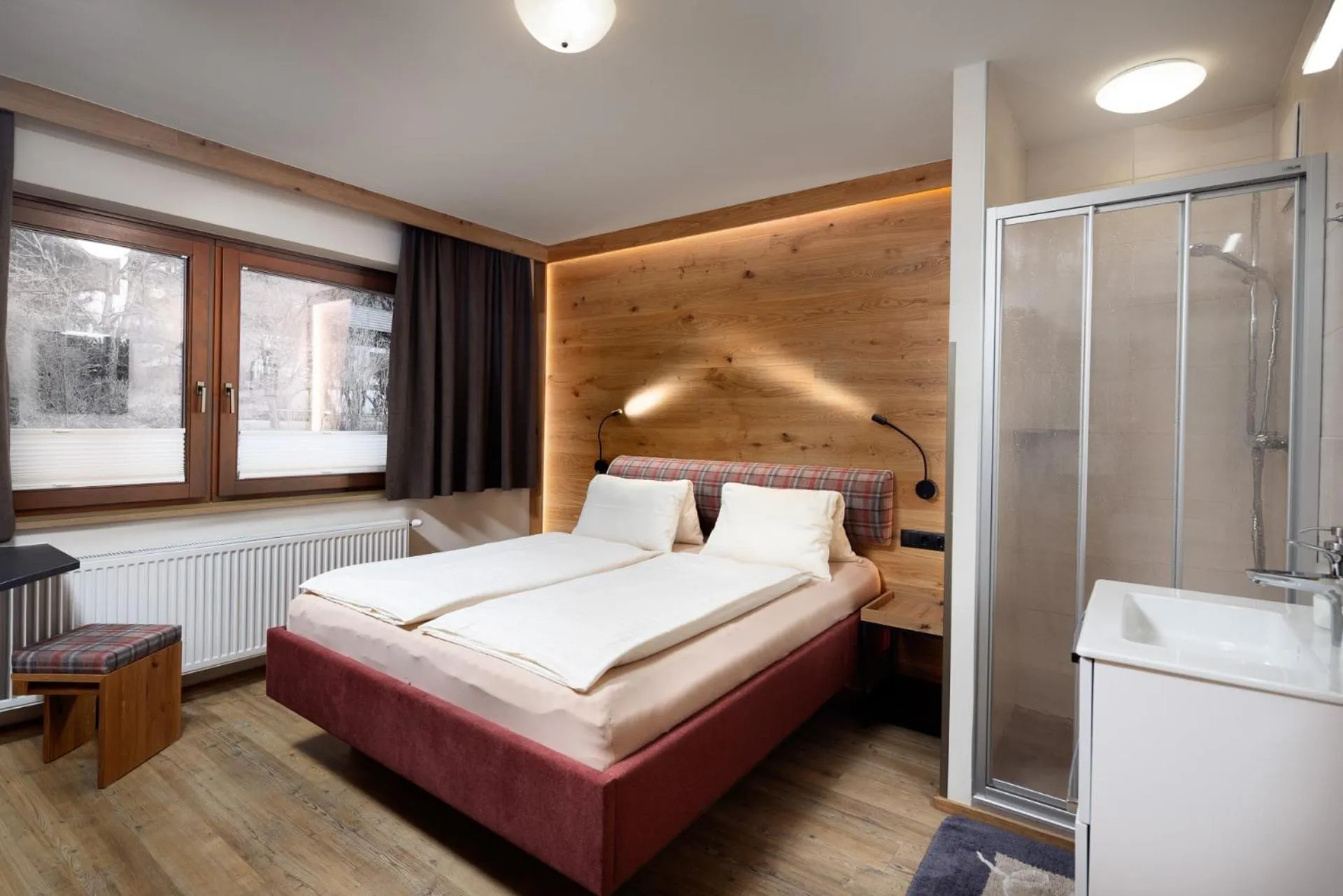 Bed in Hölzl Bed & Breakfast