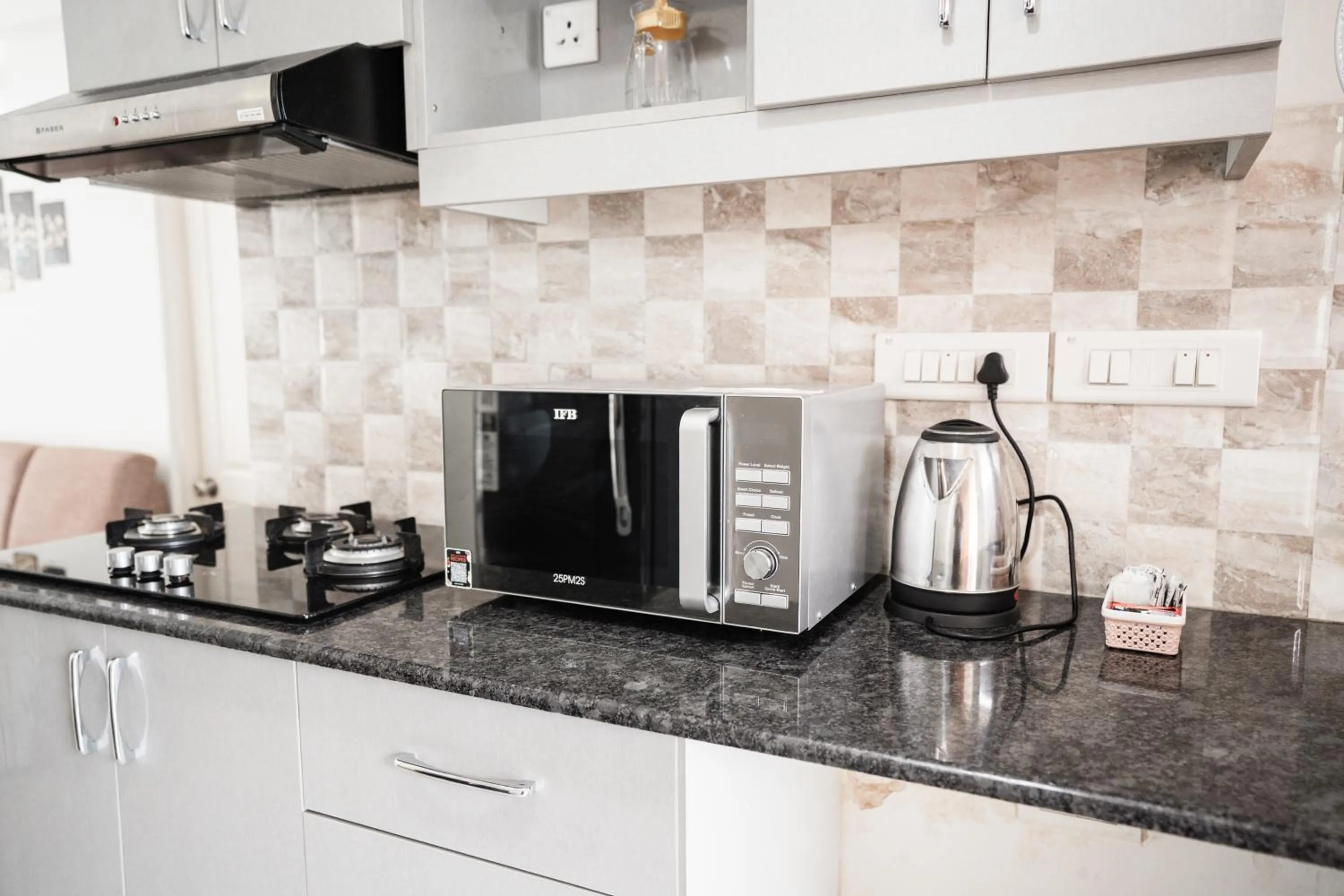 Kitchen or kitchenette in Bellagio Rezidencia 1 BHK Service Apartments