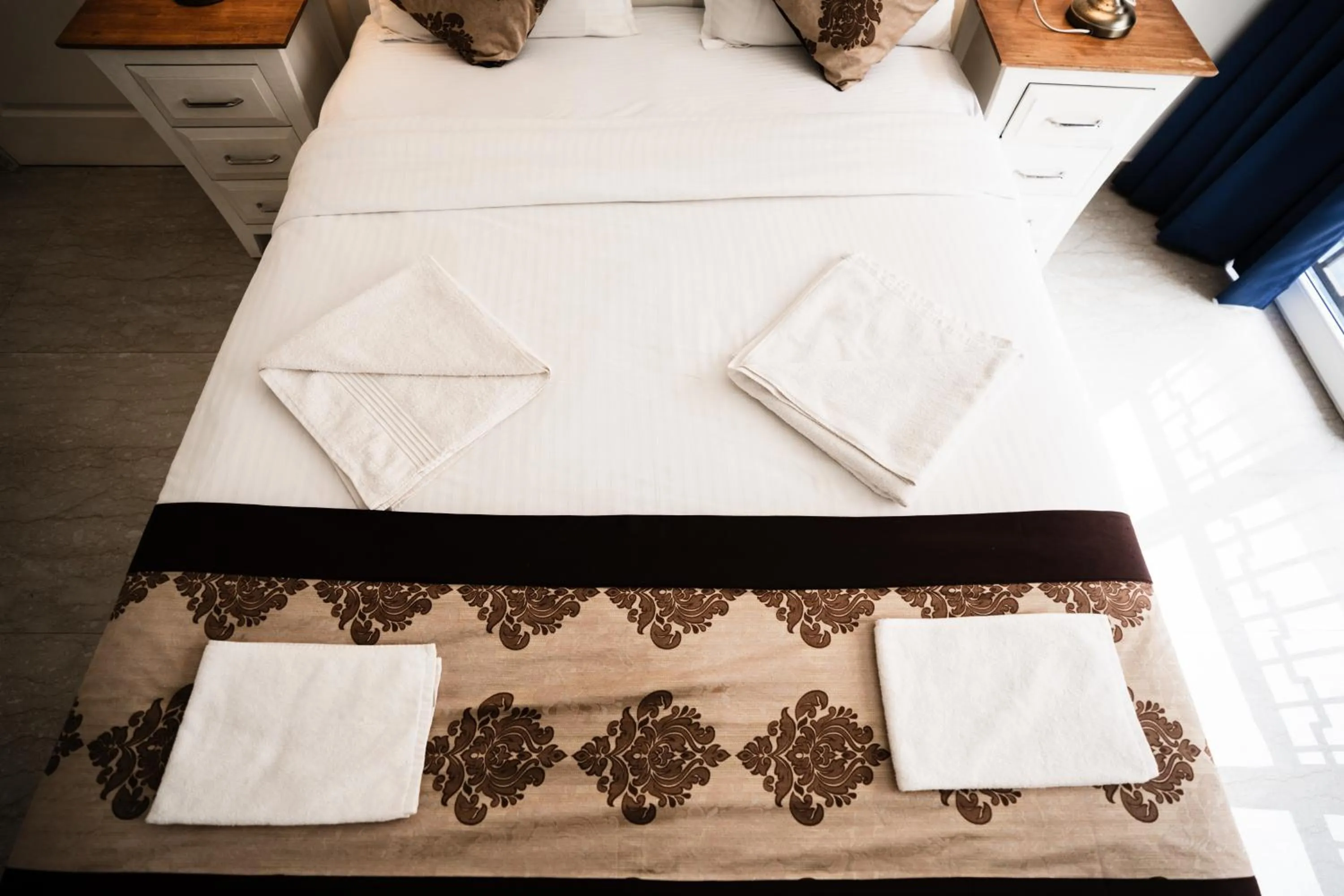 Bed in Bellagio Rezidencia 1 BHK Service Apartments