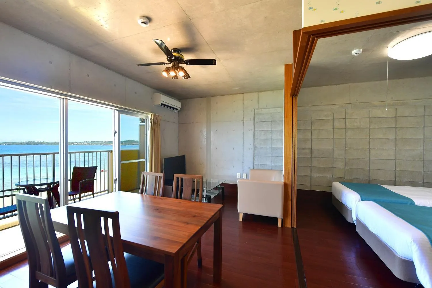 Dining area, Bed in Churaumi on the Beach Motobu
