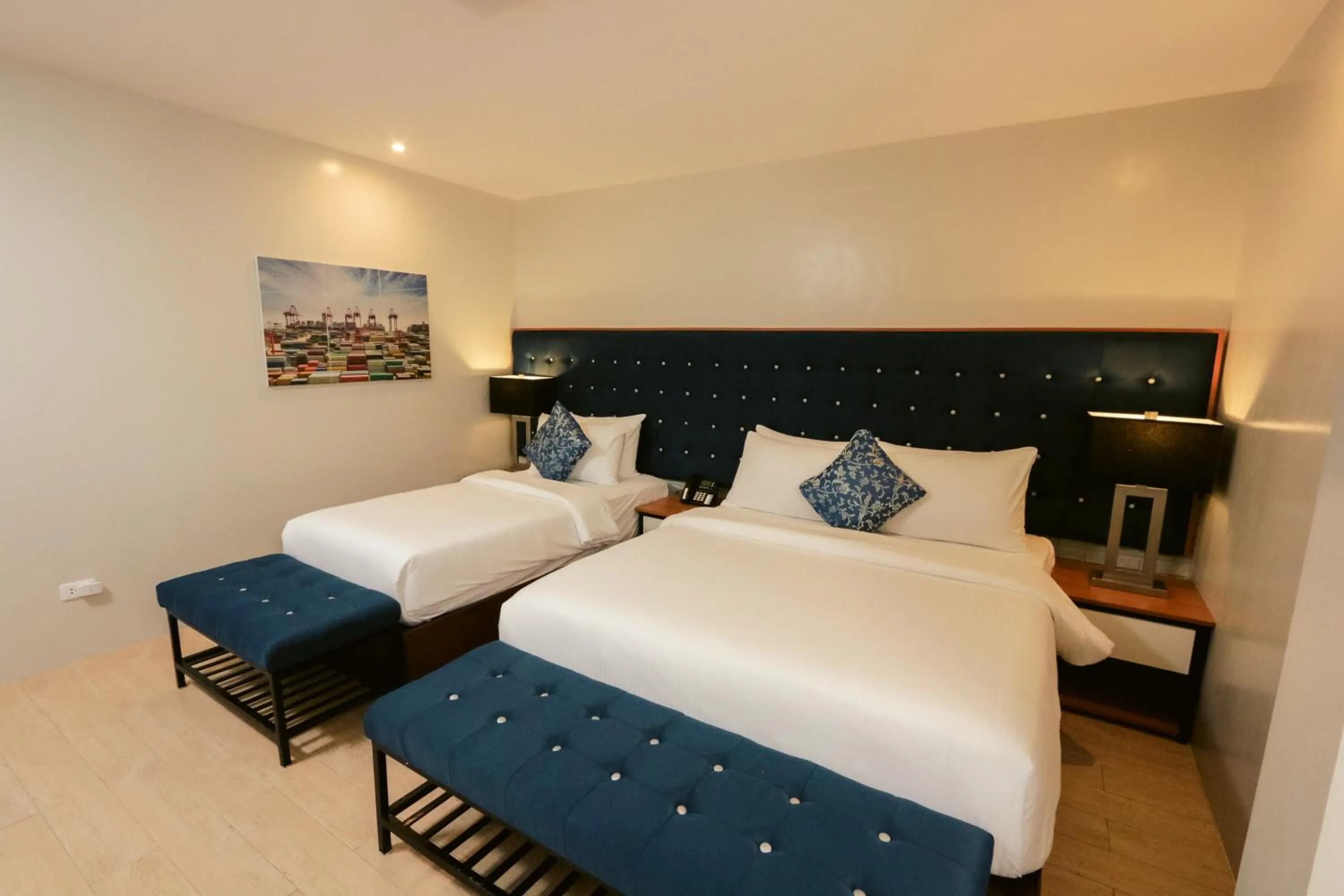 Bed in The Madeline Boutique Hotel & Suites