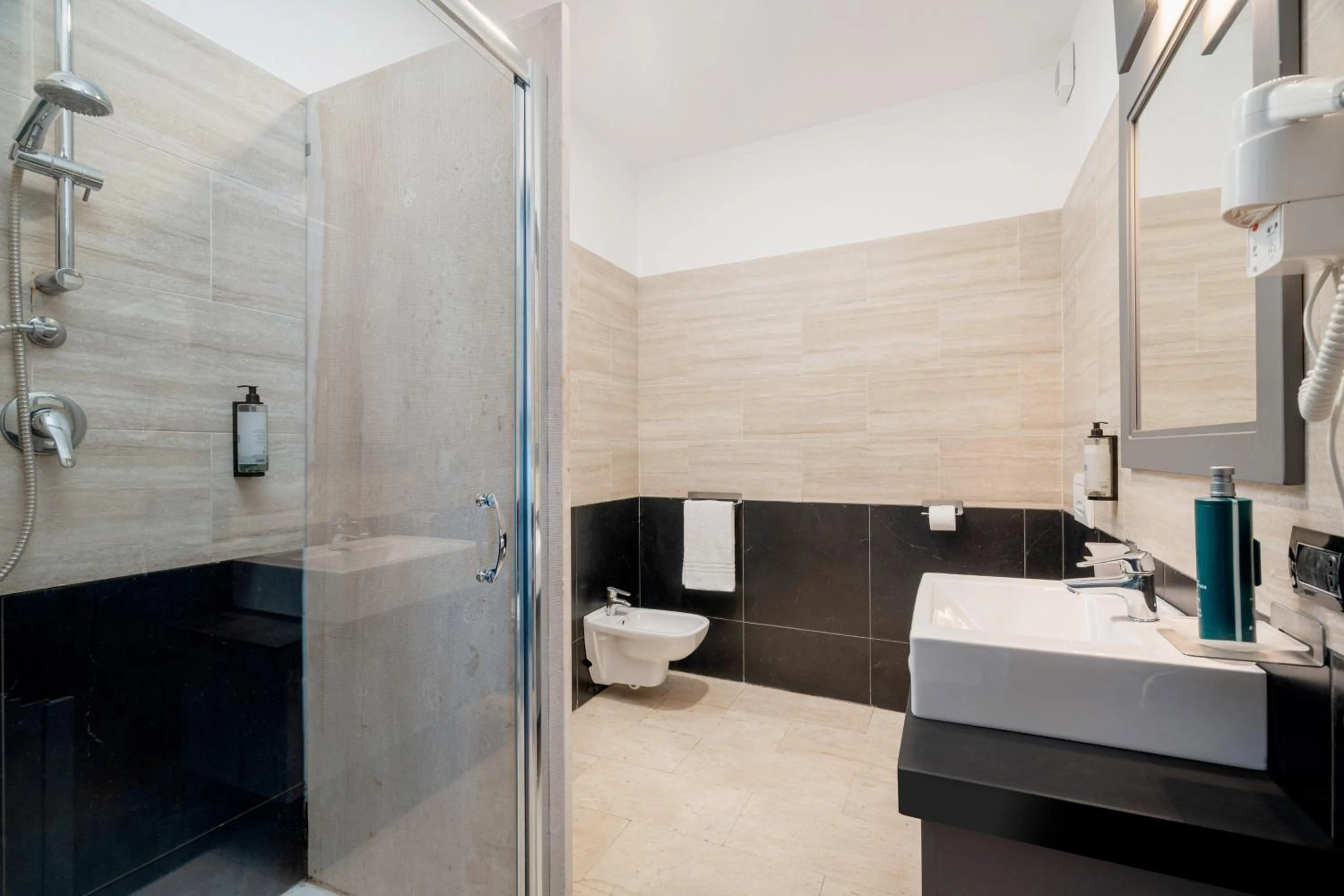 Shower in Bellevue Sardinia Resort Affiliated by Meliá