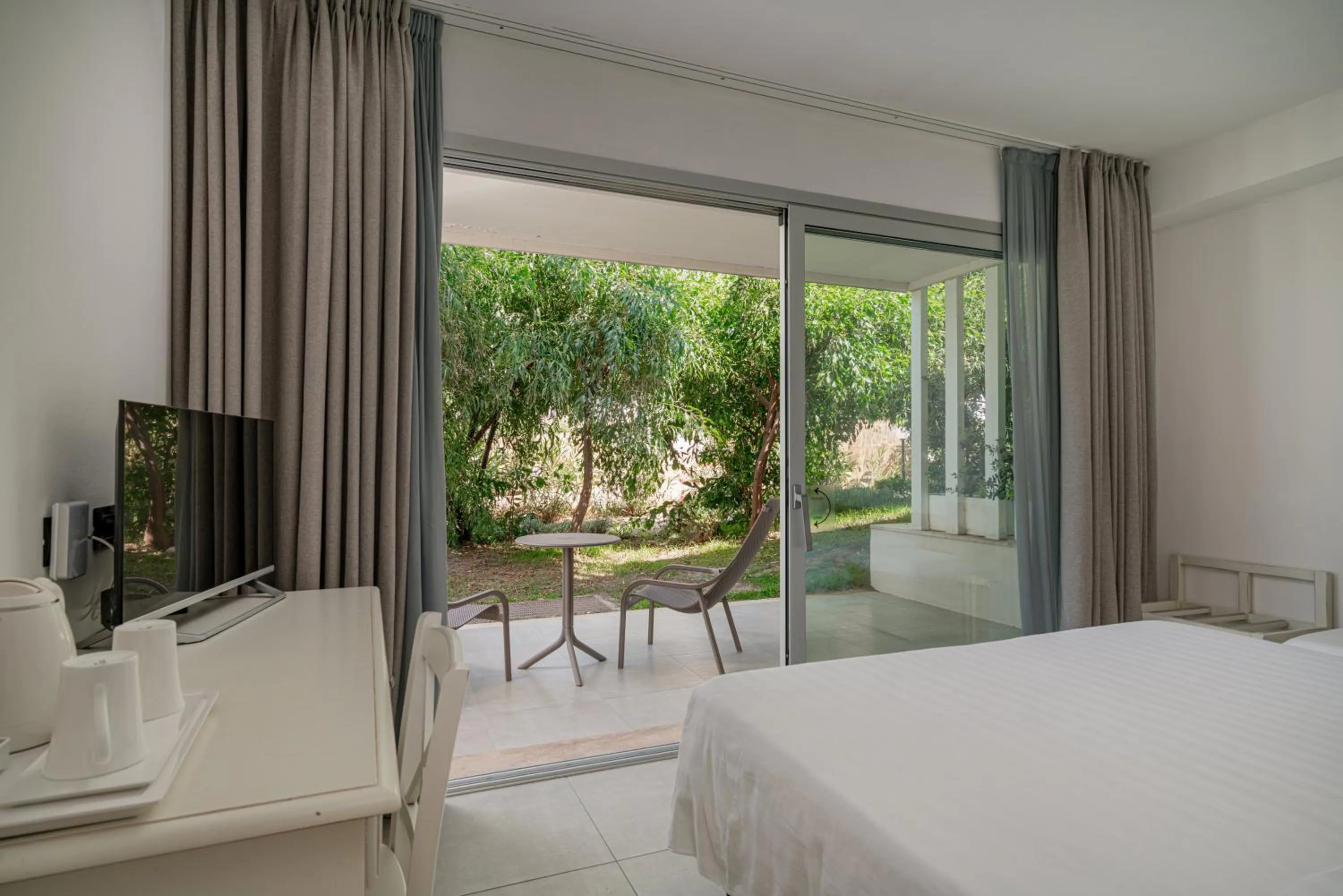 Bedroom, Bed in Bellevue Sardinia Resort Affiliated by Meliá