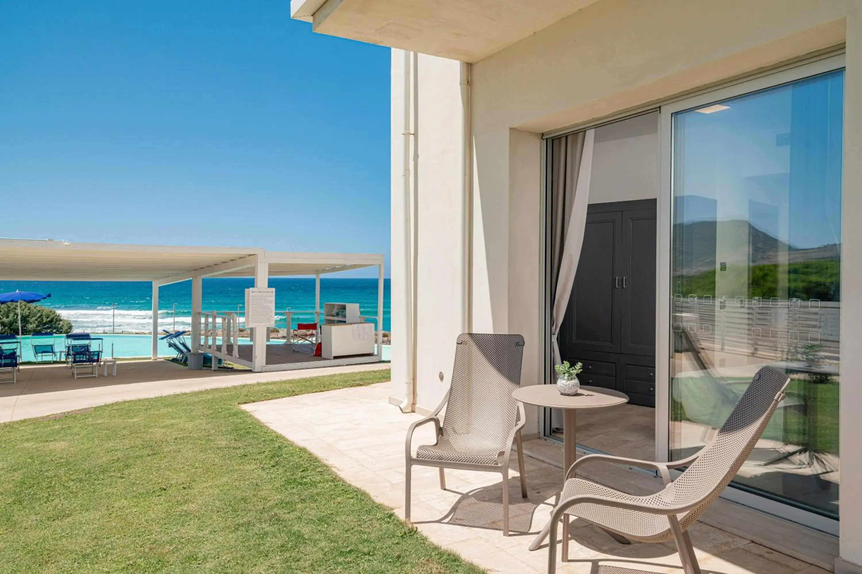 Pool view in Bellevue Sardinia Resort Affiliated by Meliá Pool view in Bellevue Sardinia Resort Affiliated by Meliá