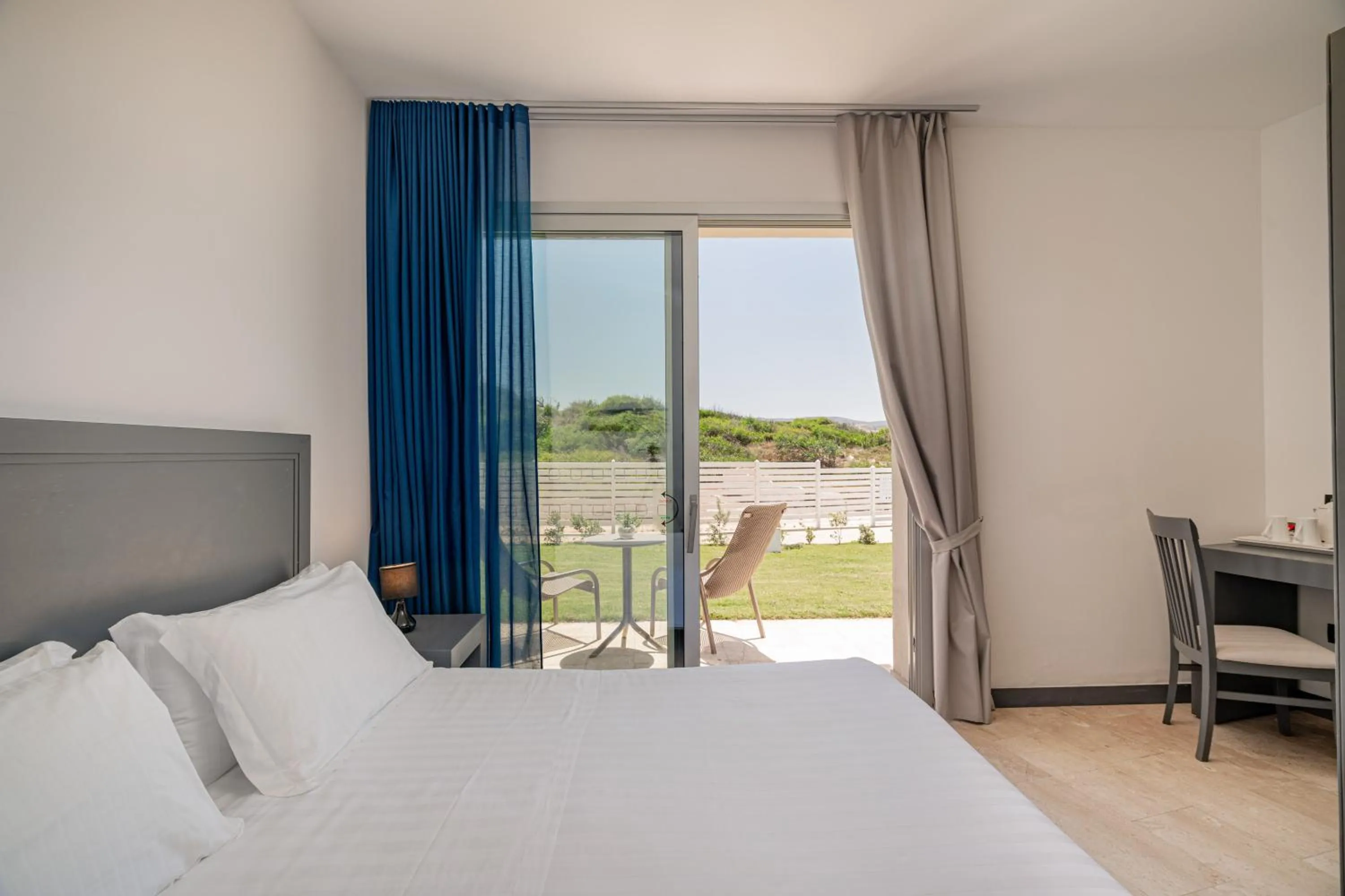 Bed in Bellevue Sardinia Resort Affiliated by Meliá