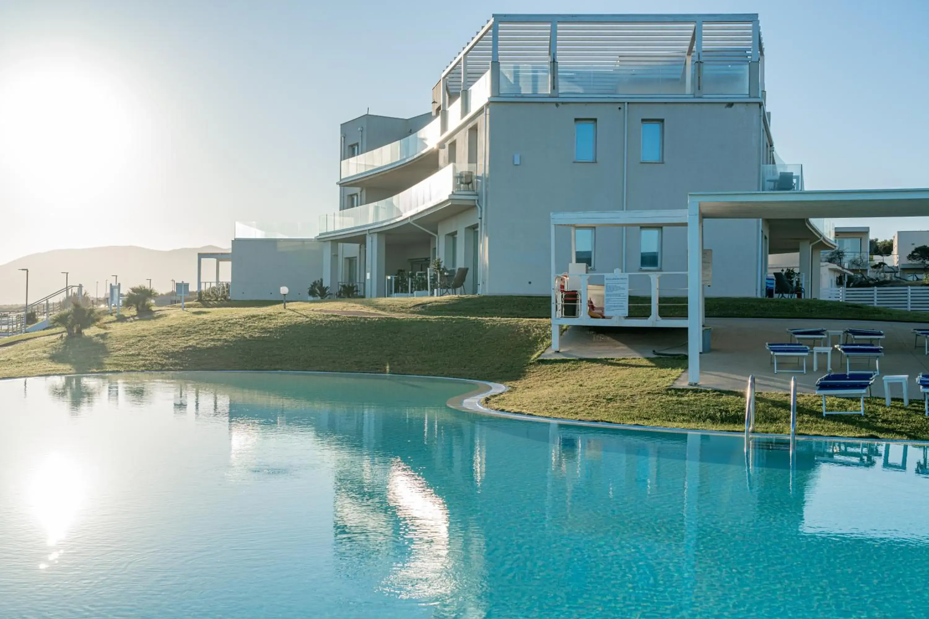 Swimming pool in Bellevue Sardinia Resort Affiliated by Meliá Swimming pool in Bellevue Sardinia Resort Affiliated by Meliá