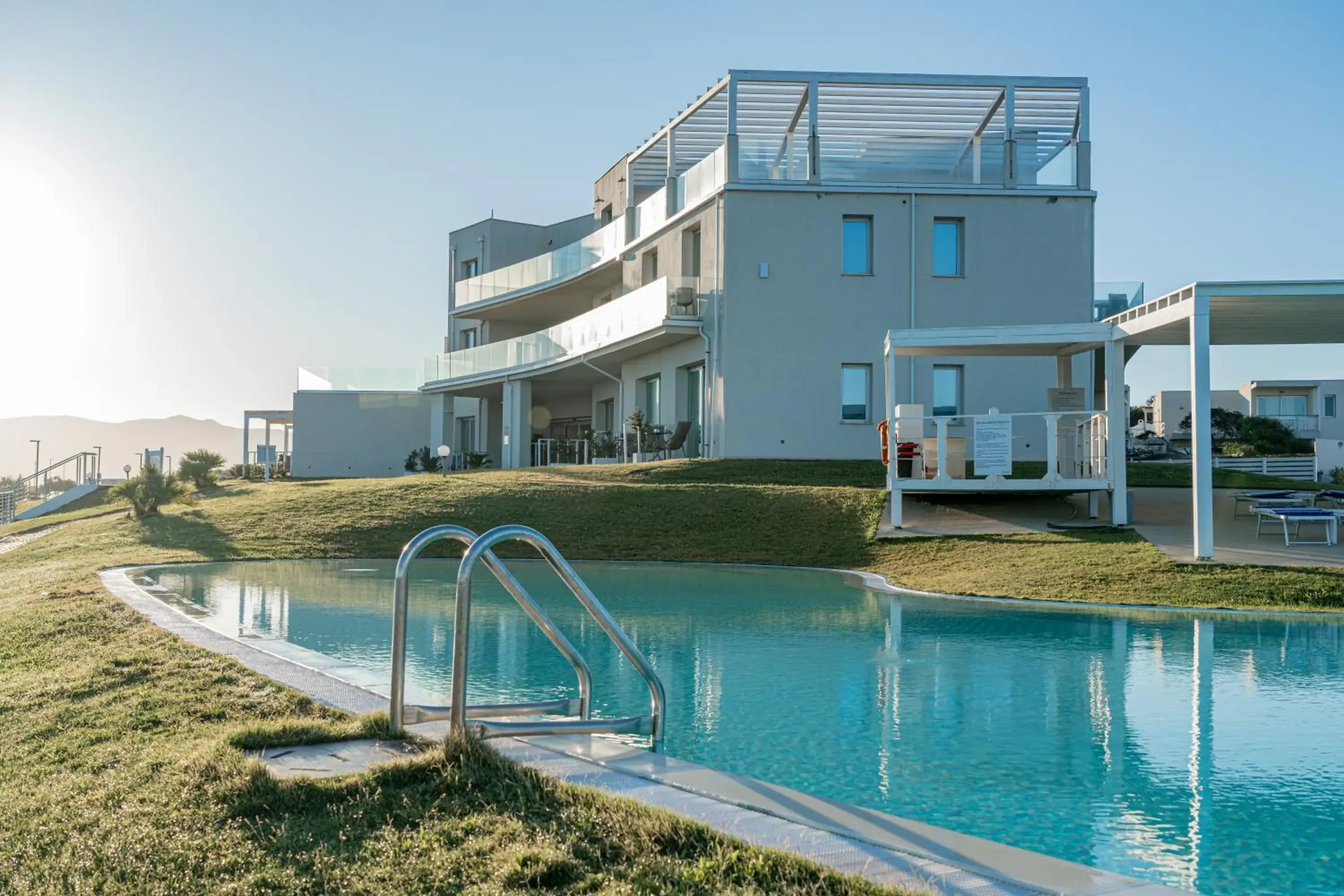 Swimming pool in Bellevue Sardinia Resort Affiliated by Meliá Swimming pool in Bellevue Sardinia Resort Affiliated by Meliá