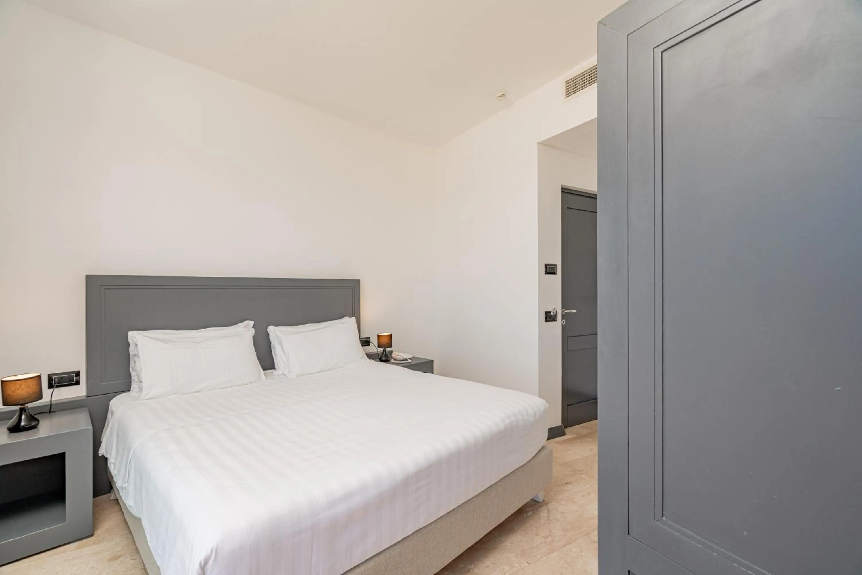 Bed in Bellevue Sardinia Resort Affiliated by Meliá