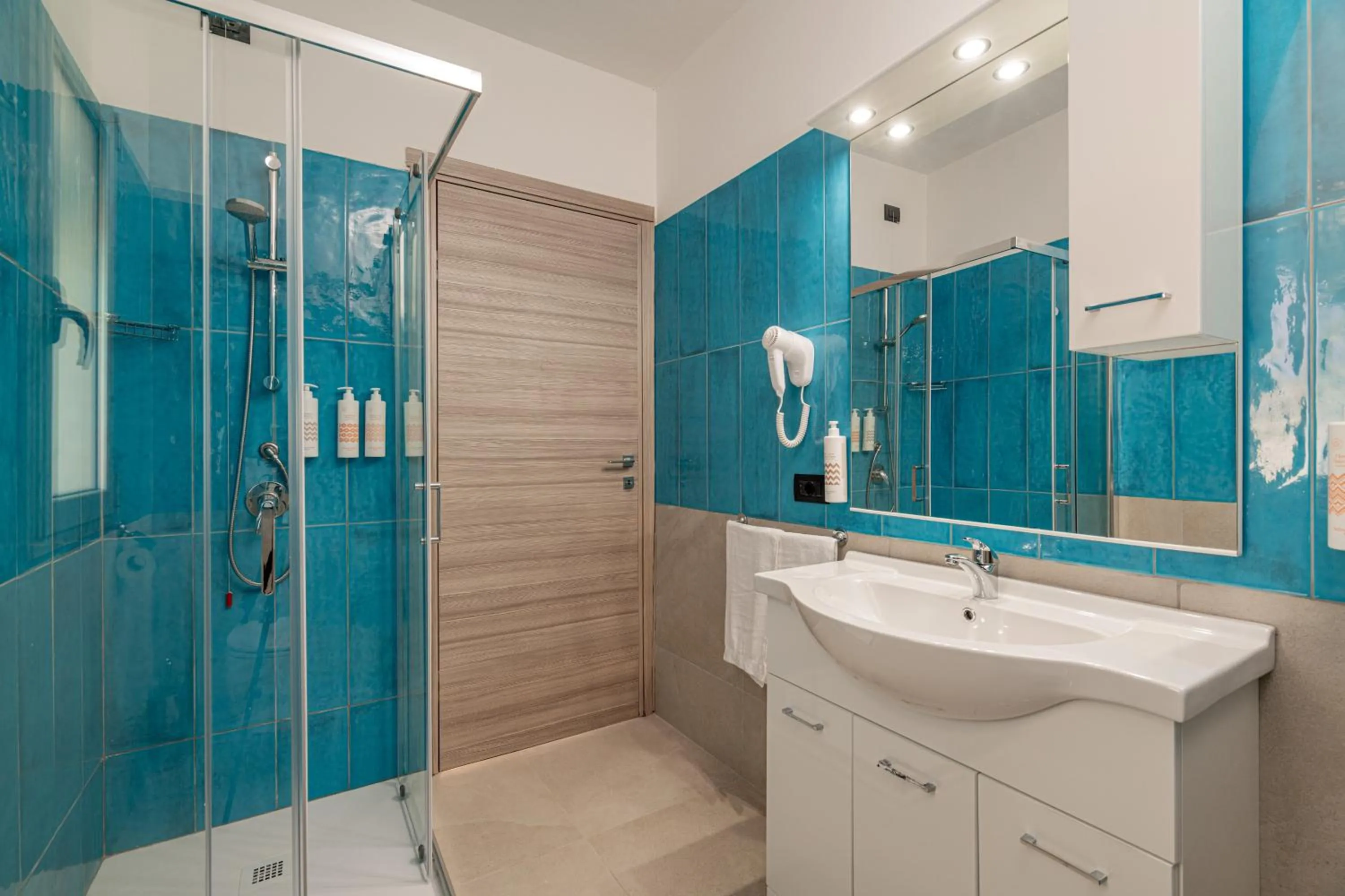 Shower in Bellevue Sardinia Resort Affiliated by Meliá