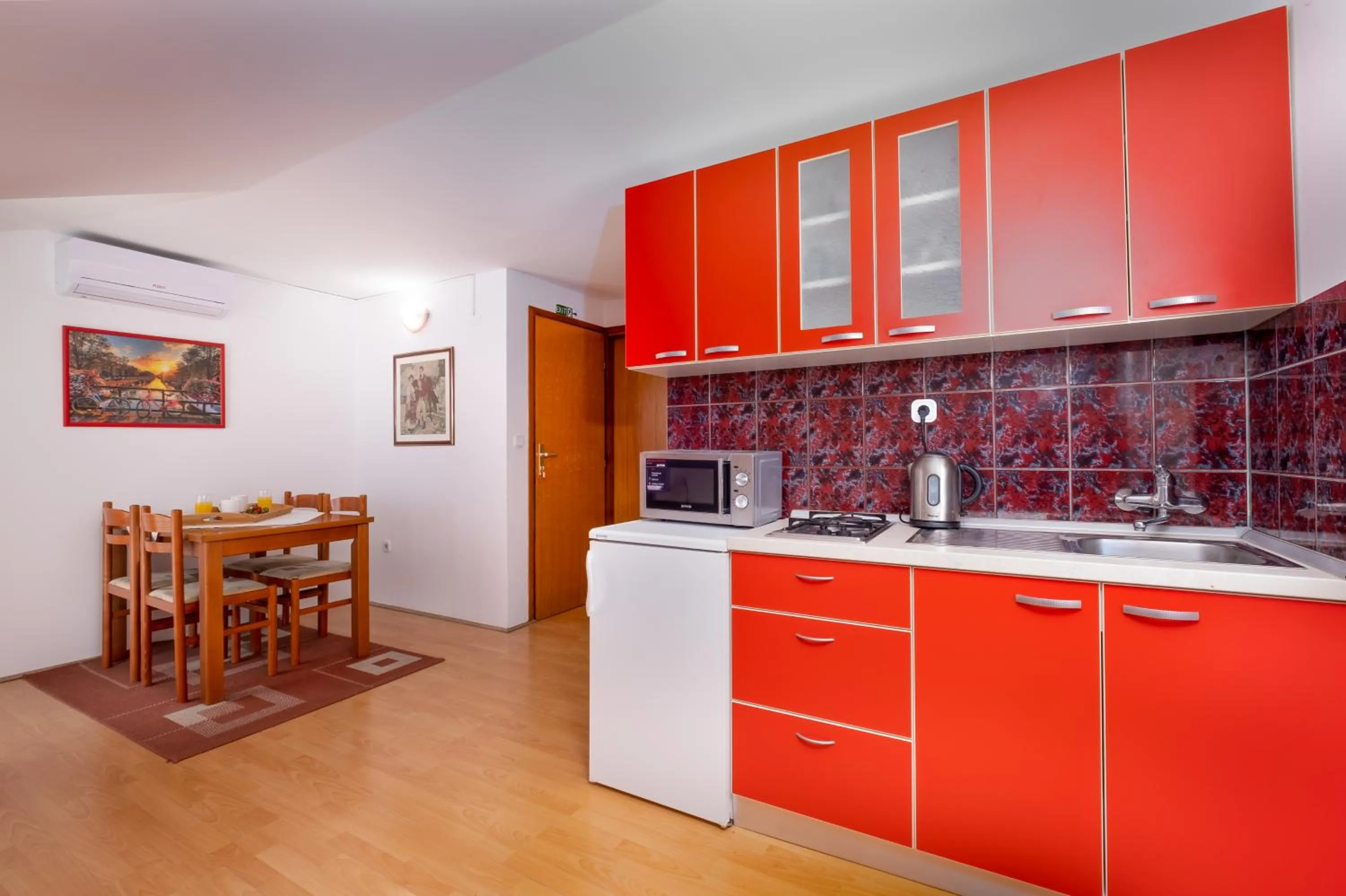 Kitchen or kitchenette in Apartments Katica