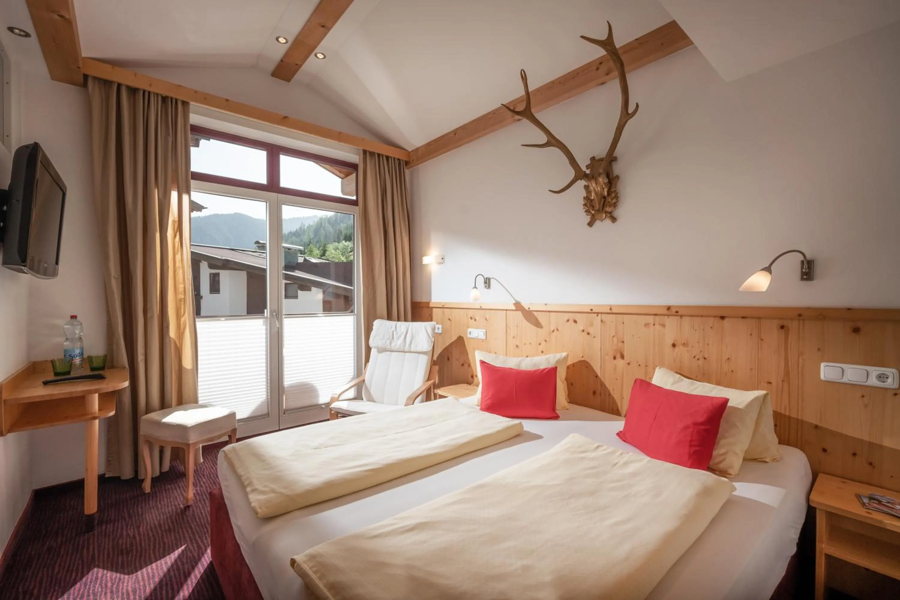 Photo of the whole room, Bed in alpenrose hotel-garni