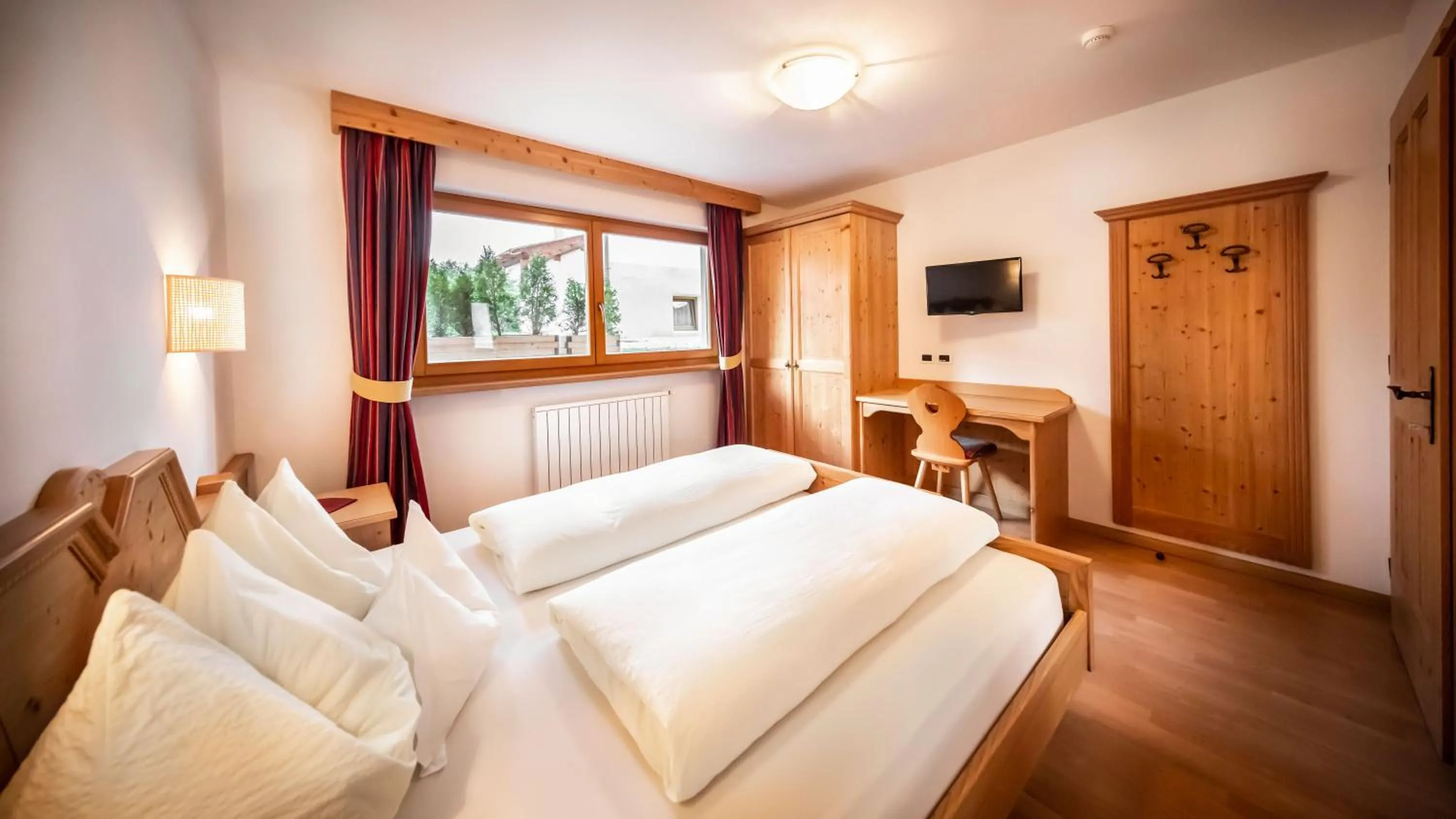 Bed in Apartments Chalet Maria