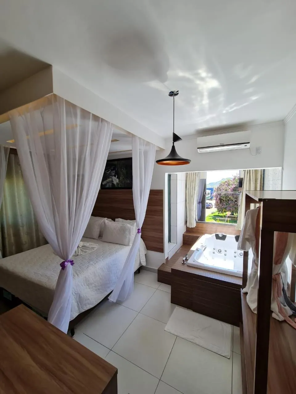 Bed in Pousada Araras