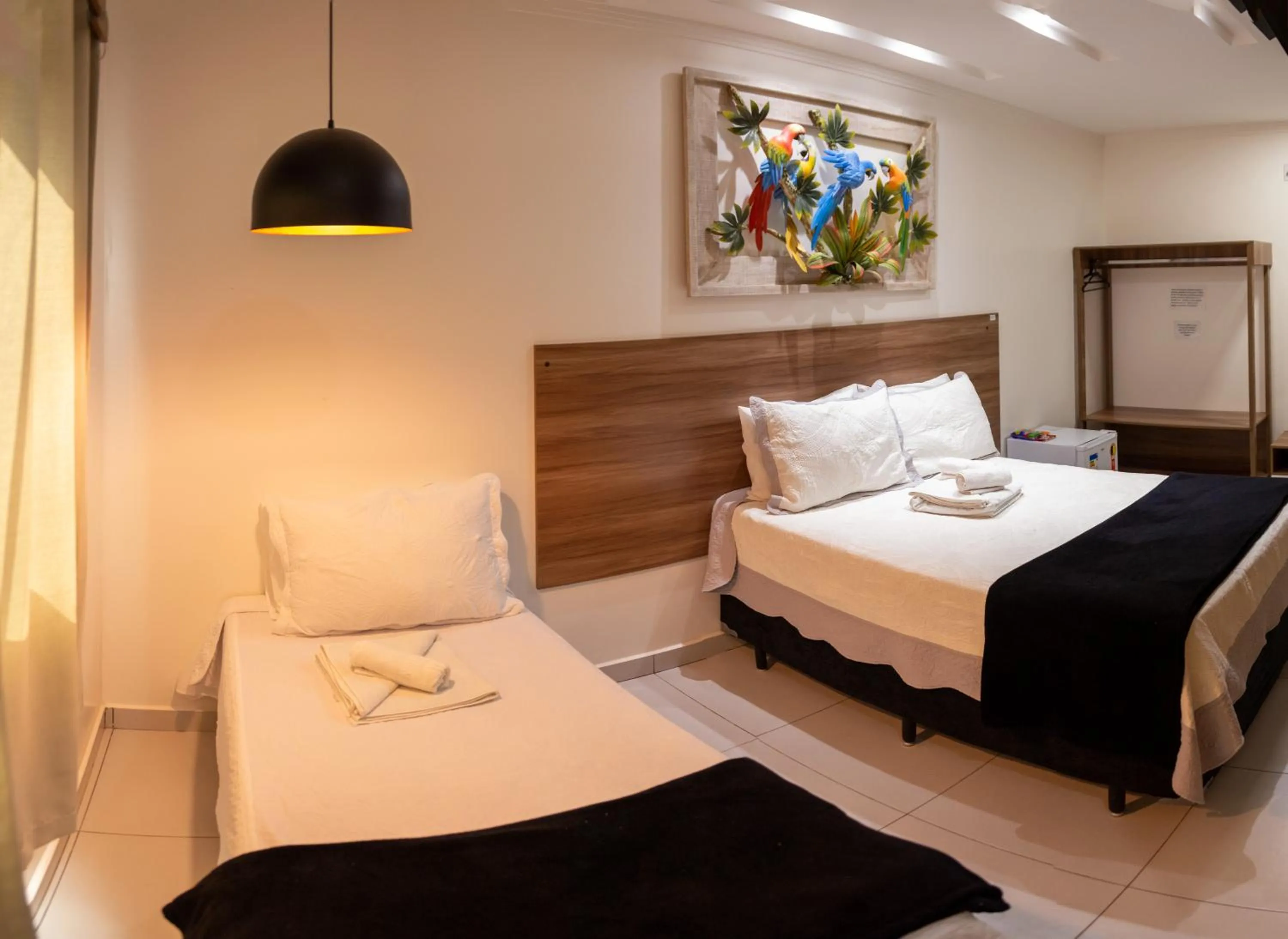Bed in Pousada Araras