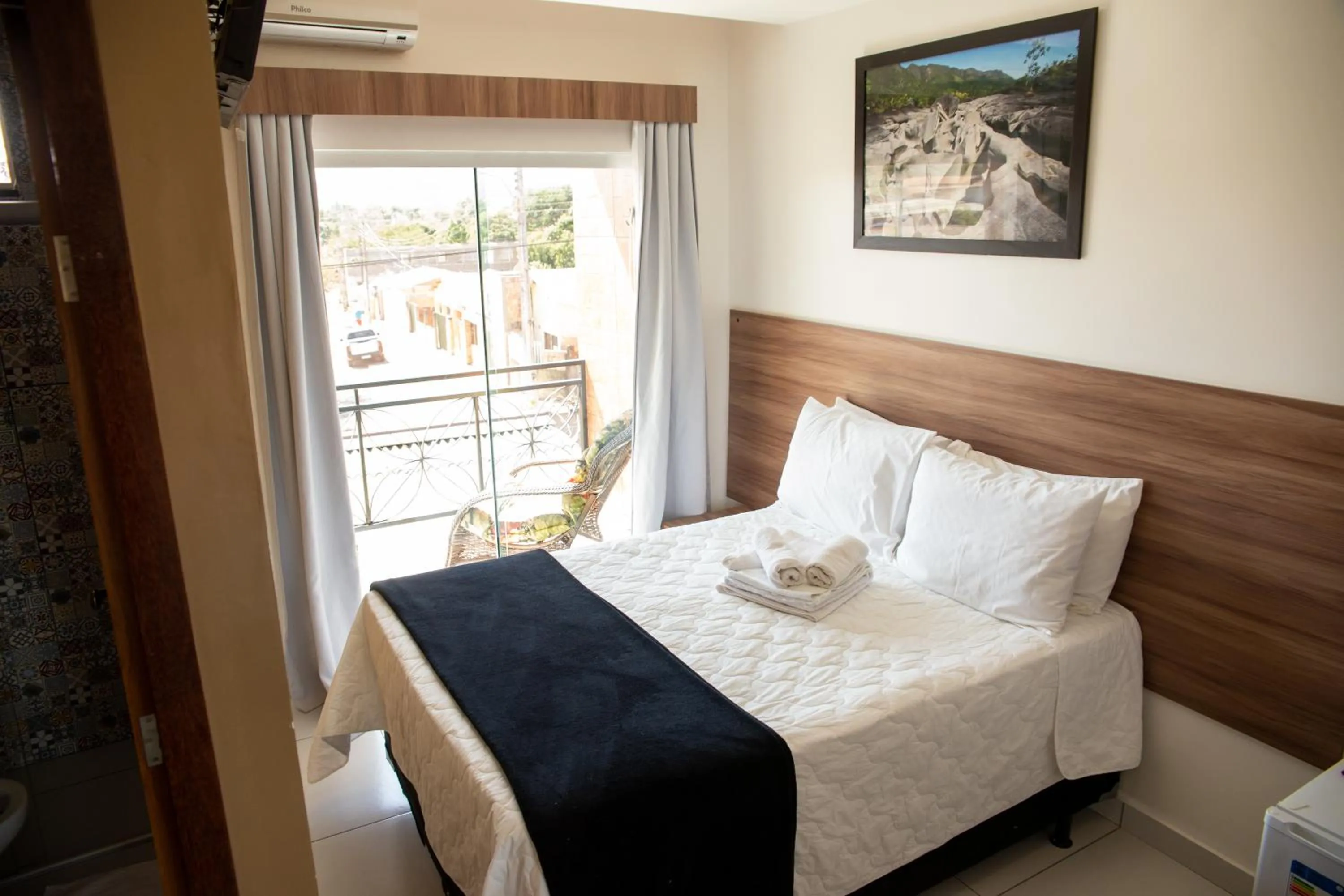 Bed in Pousada Araras
