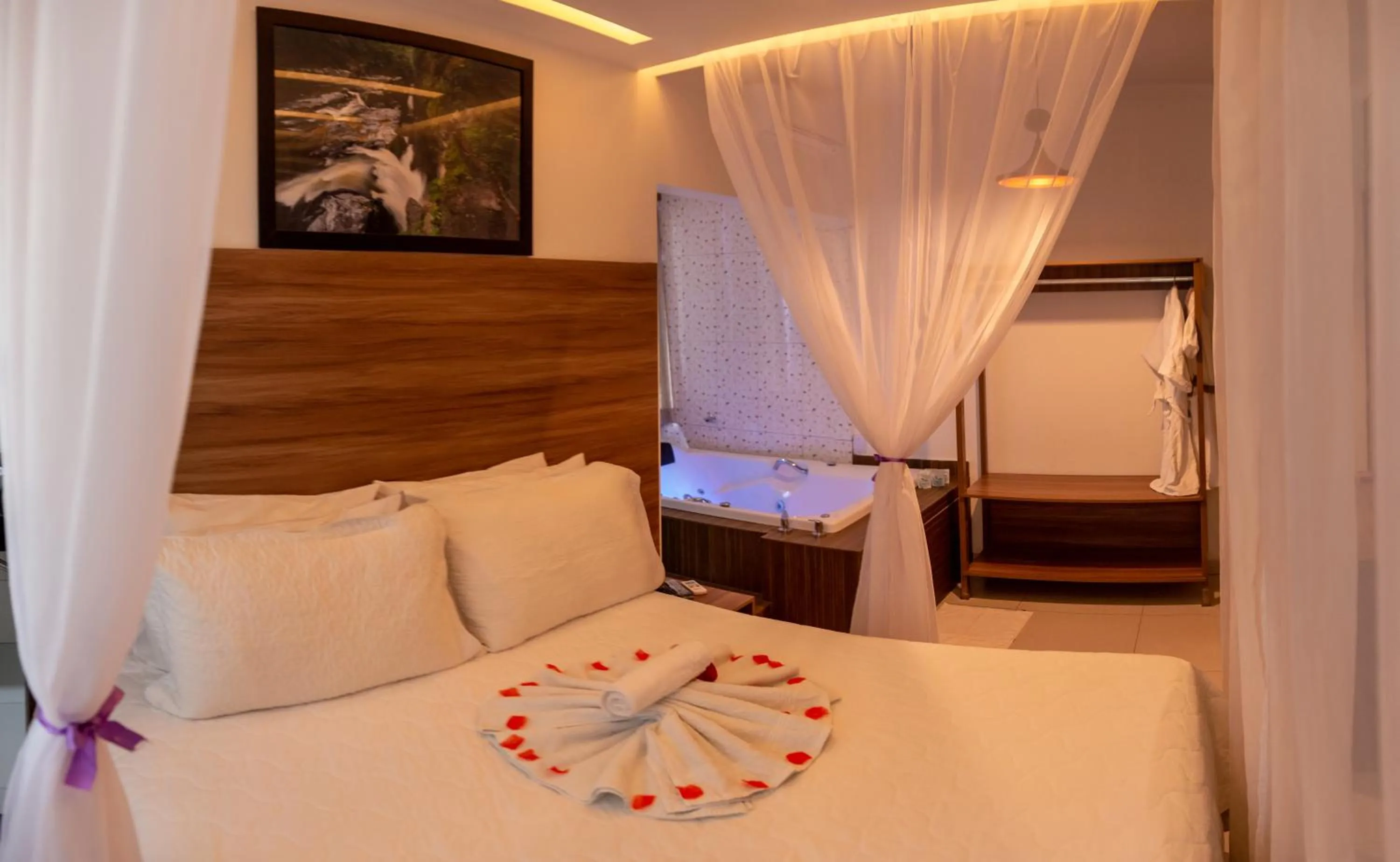 Bed in Pousada Araras