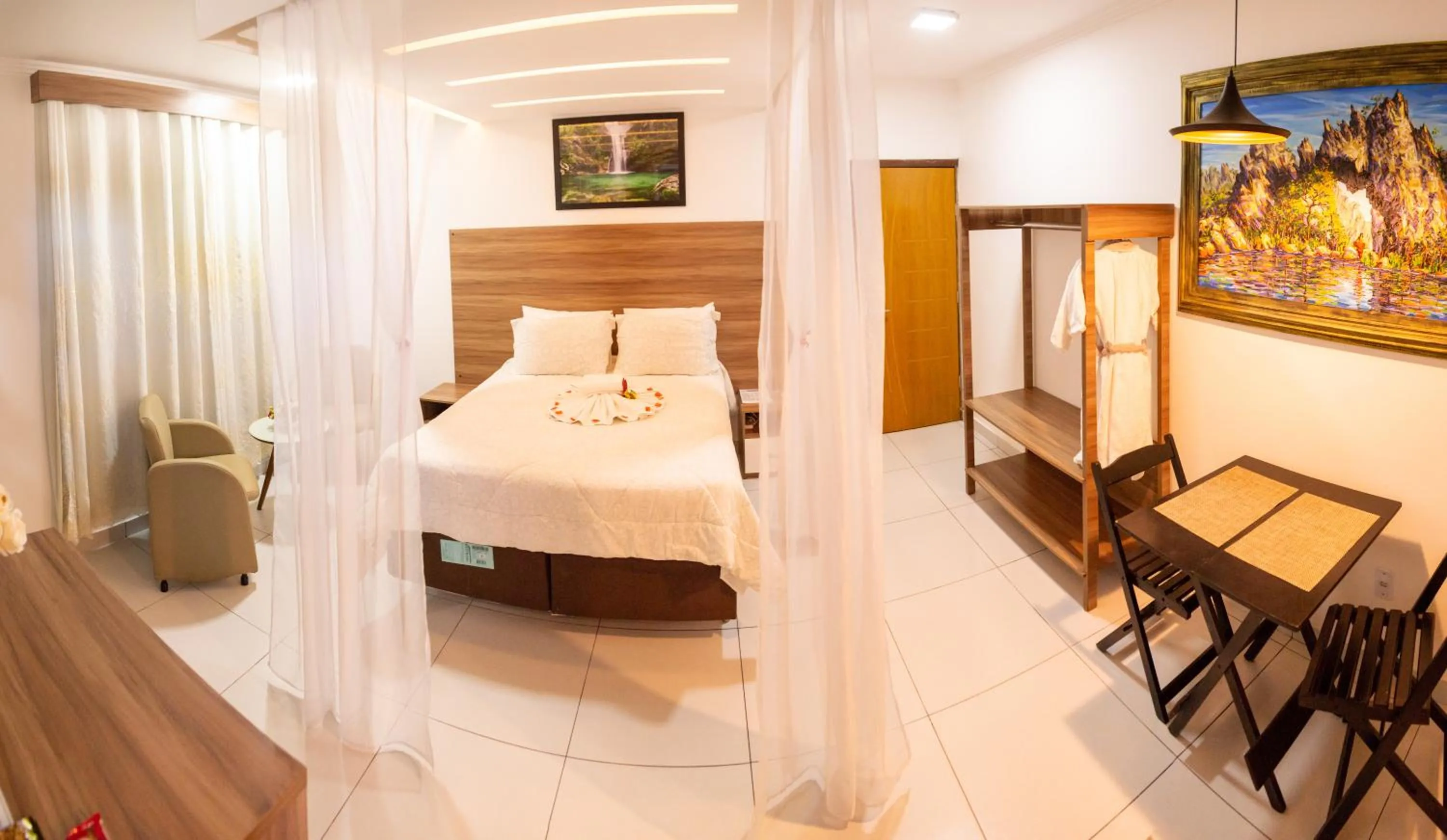 Bed in Pousada Araras