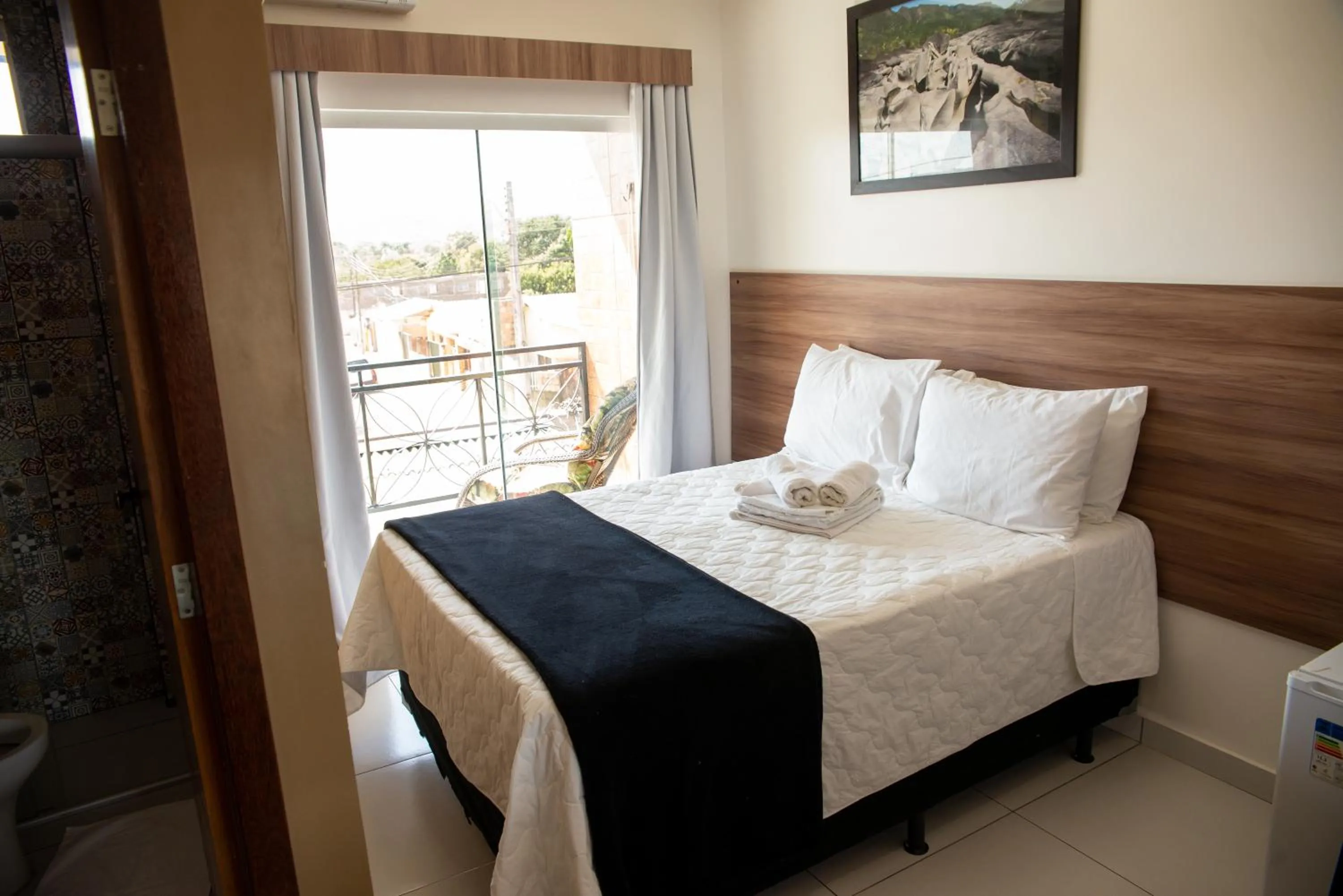 Bed in Pousada Araras